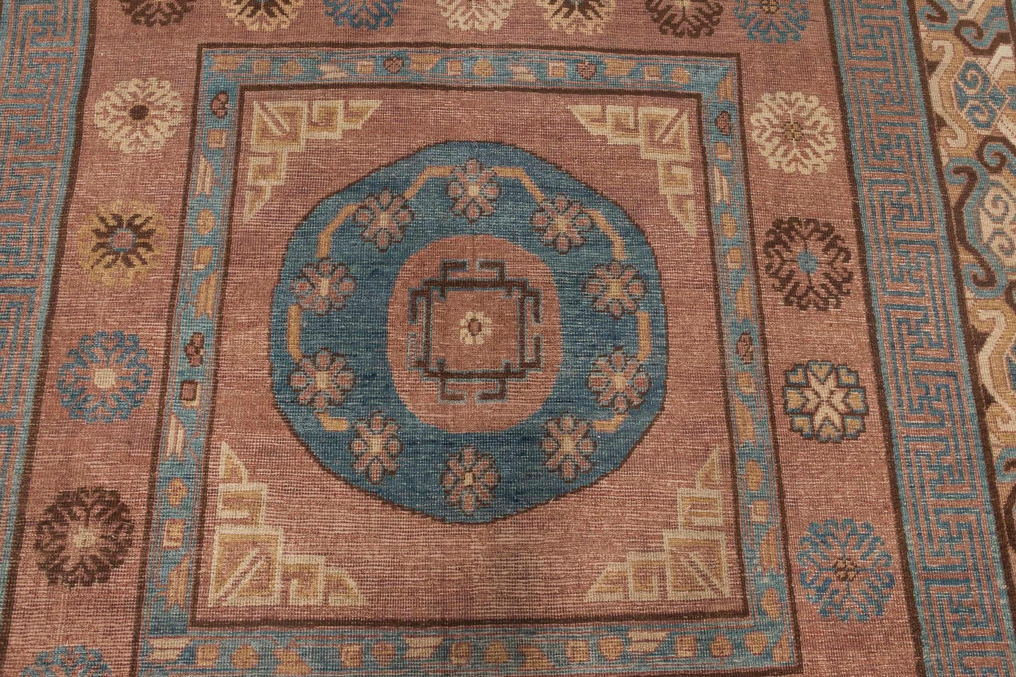 Mid-20th century geometric brown, blue Samarkand hand knotted wool rug
Size: 6'9