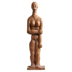 Sculpture d'art populaire scandinave du milieu du 20e siècle représentant un être humain.