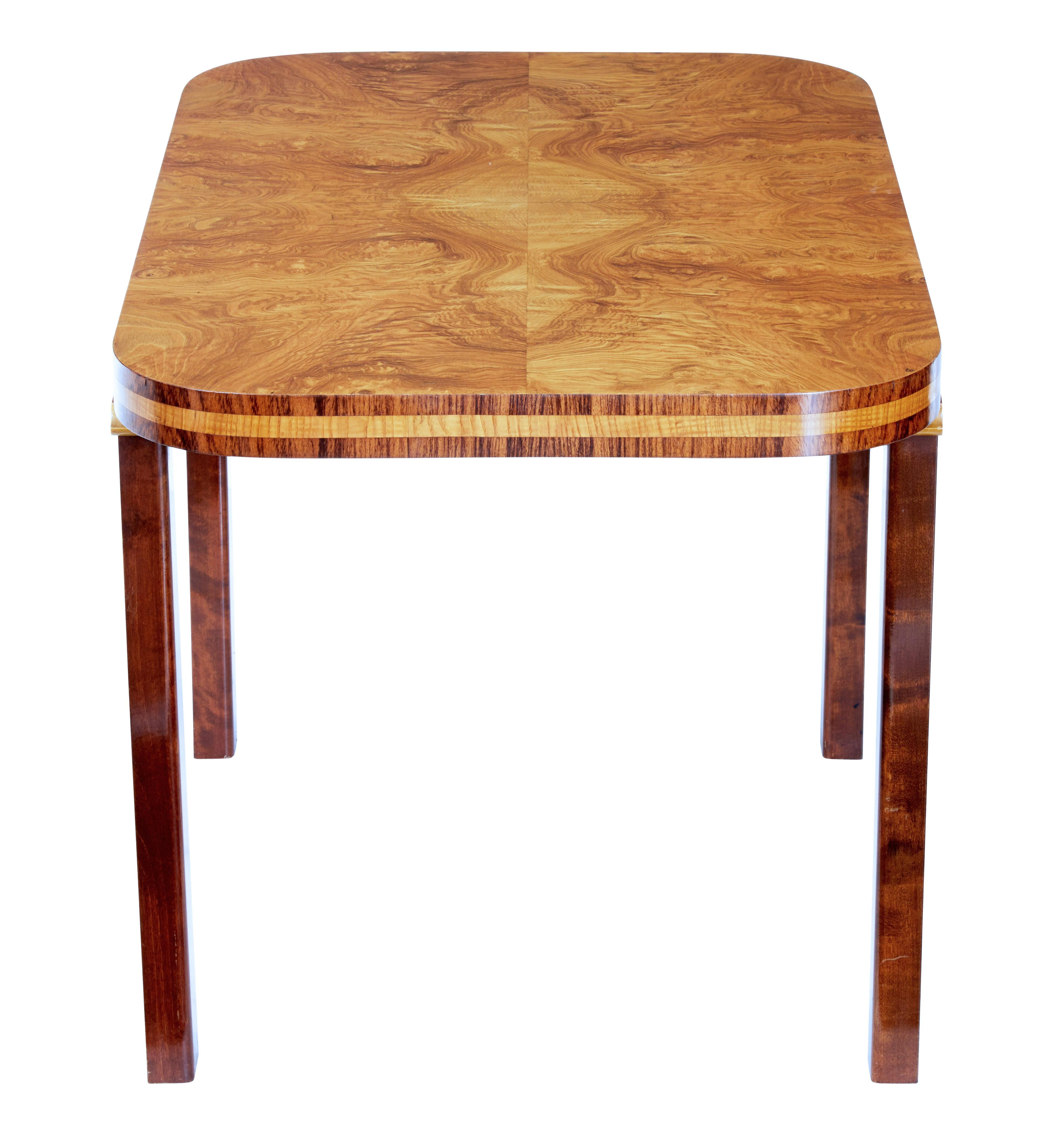 Mid-20th century Scandinavian elm root coffee table, circa 1950.

Beautiful quality Art Deco inspired coffee, made from fine quality elm root timber with quarter matched veneers to the top. Crossbanded with kingwood to the top edge and legs.