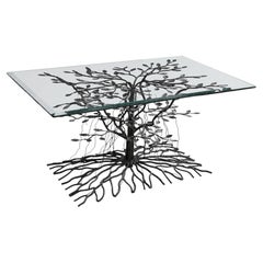 Table sculpturale en métal moulé en forme d'arbre, datant du milieu du XXe siècle