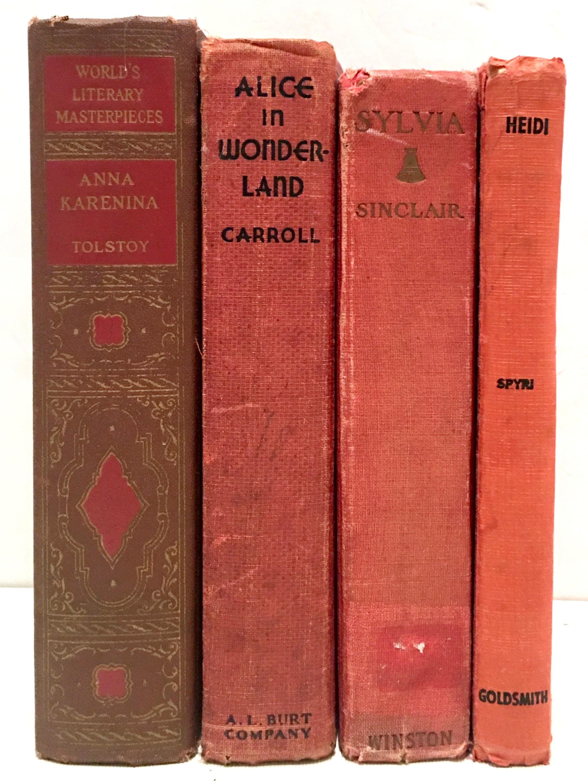 Mid-20th Century set of four red cloth books. Set of four includes the following titles, Sylvia, Alice In Wonderland, Anna Karenina and Heidi.
Sylvia by, Upton Sinclair 1st Edition-1913 (3rd Printing), publisher the John C. Winston Company 413