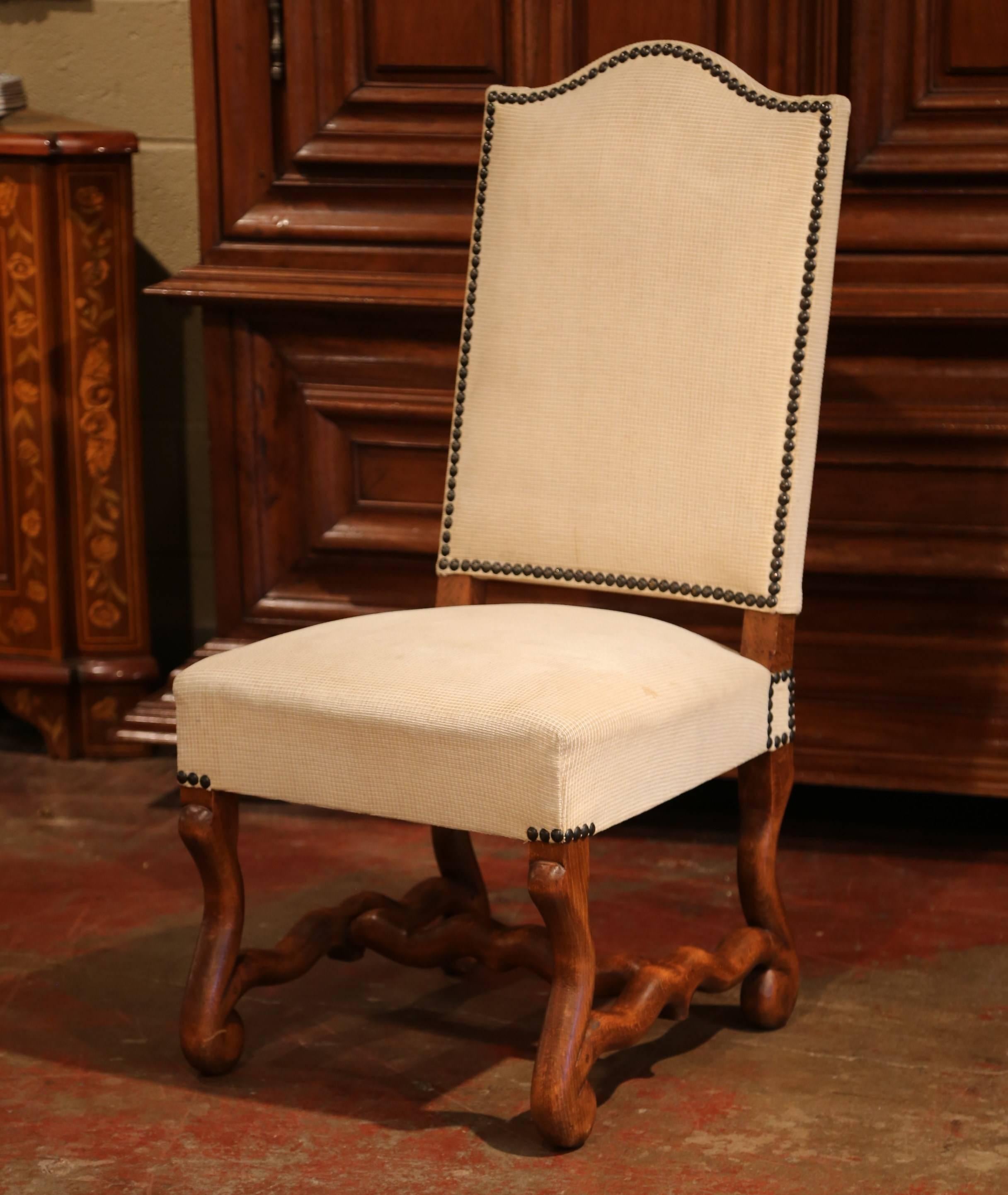 This elegant set of six side chairs was crafted in France, circa 1950. Each chair with arched back, features carved 
