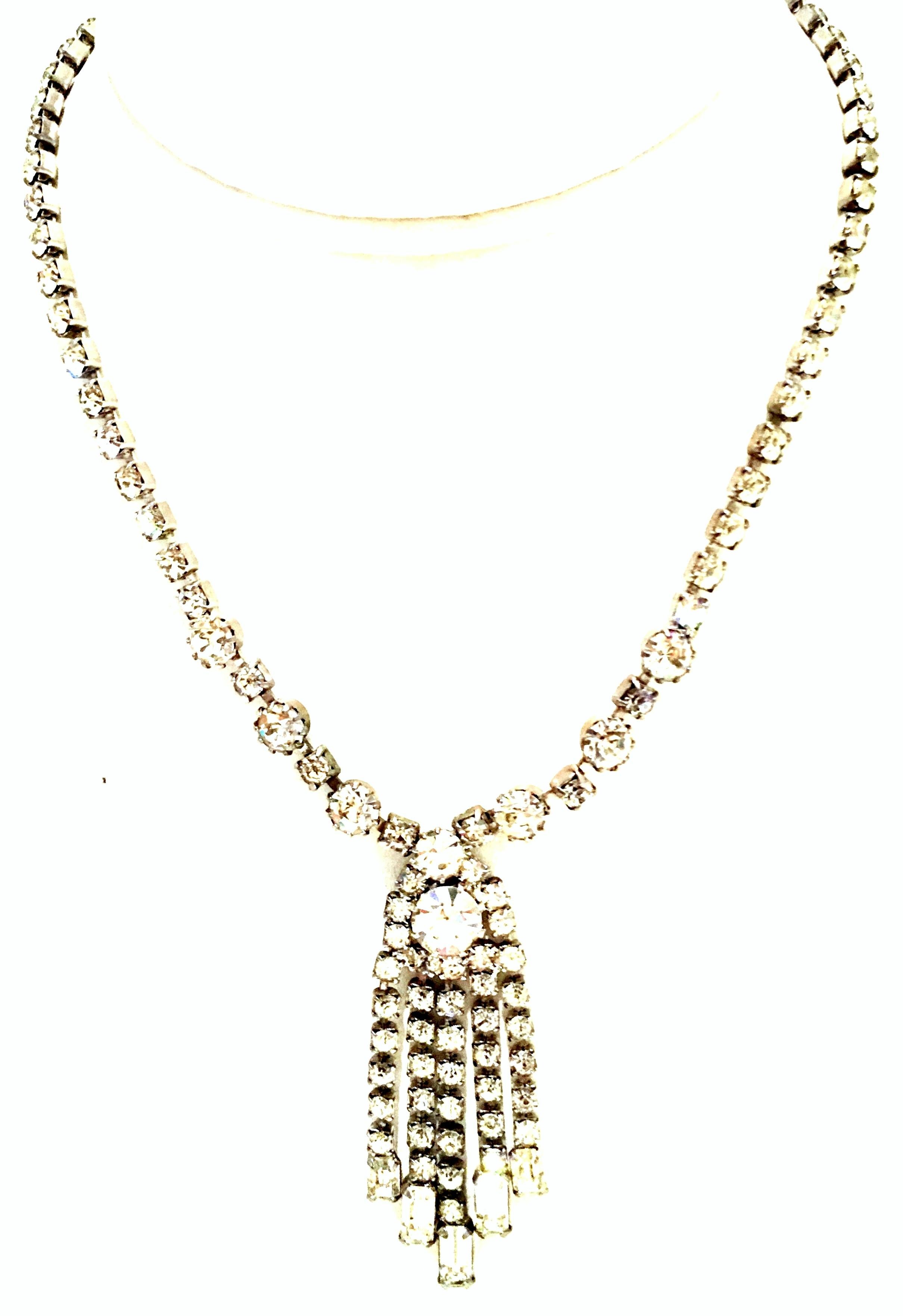 20th Century Silver & Austrian Crystal Fringe Tassel Choker Style Necklace By, Weiss. This brilliant  silver rhodium plate with Swarovski cut crystal rhinestones necklace features, baguette and round shaped stones. The central ornament measures