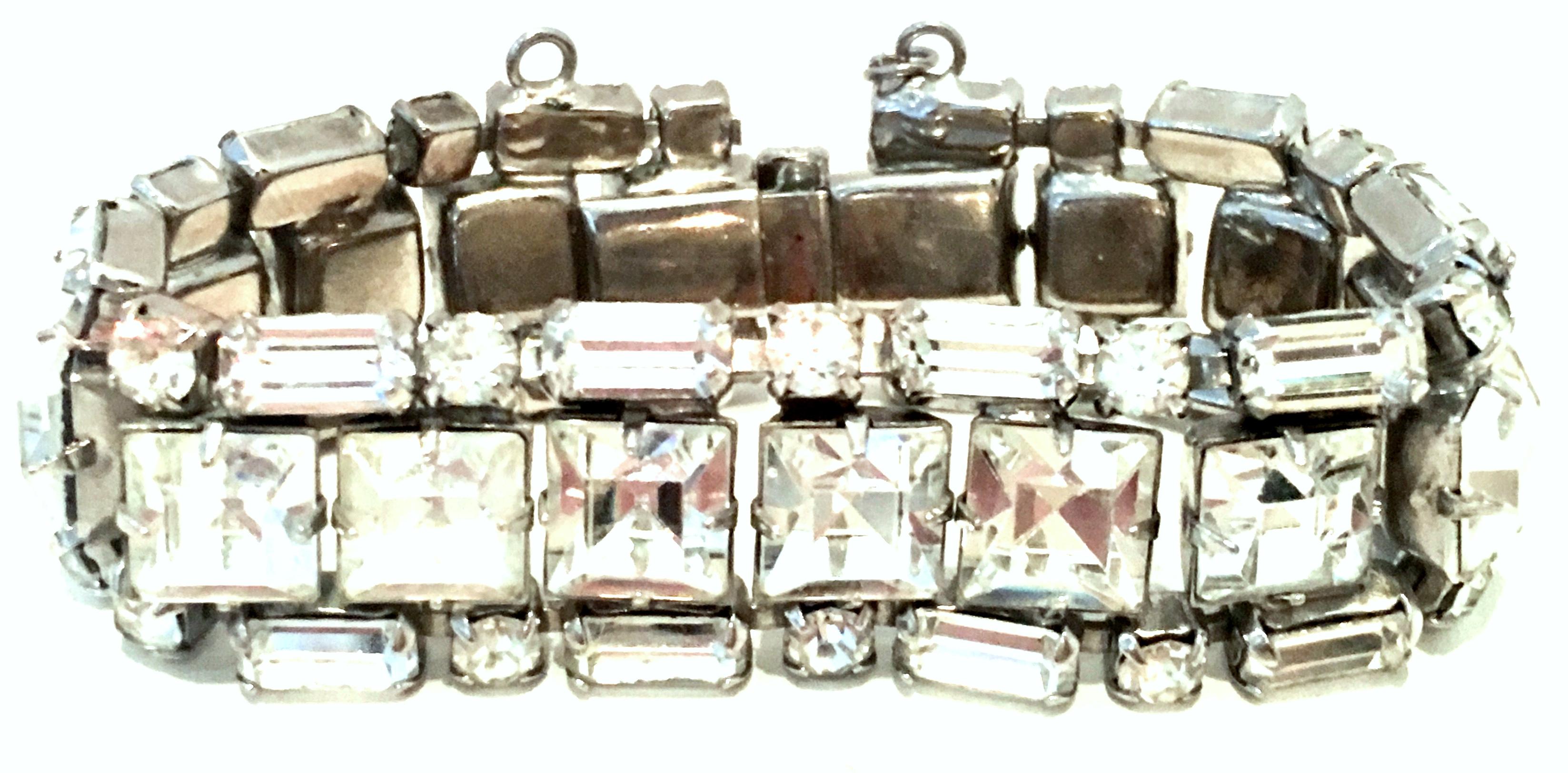 Mid-Century Art Deco Style Silver & Austrian Crystal Link Bracelet By, Weiss. This collectors piece by Weiss features silver plate metal with brilliant crystal clear fancy prong set colorless stones.The large central stones measure approximately,