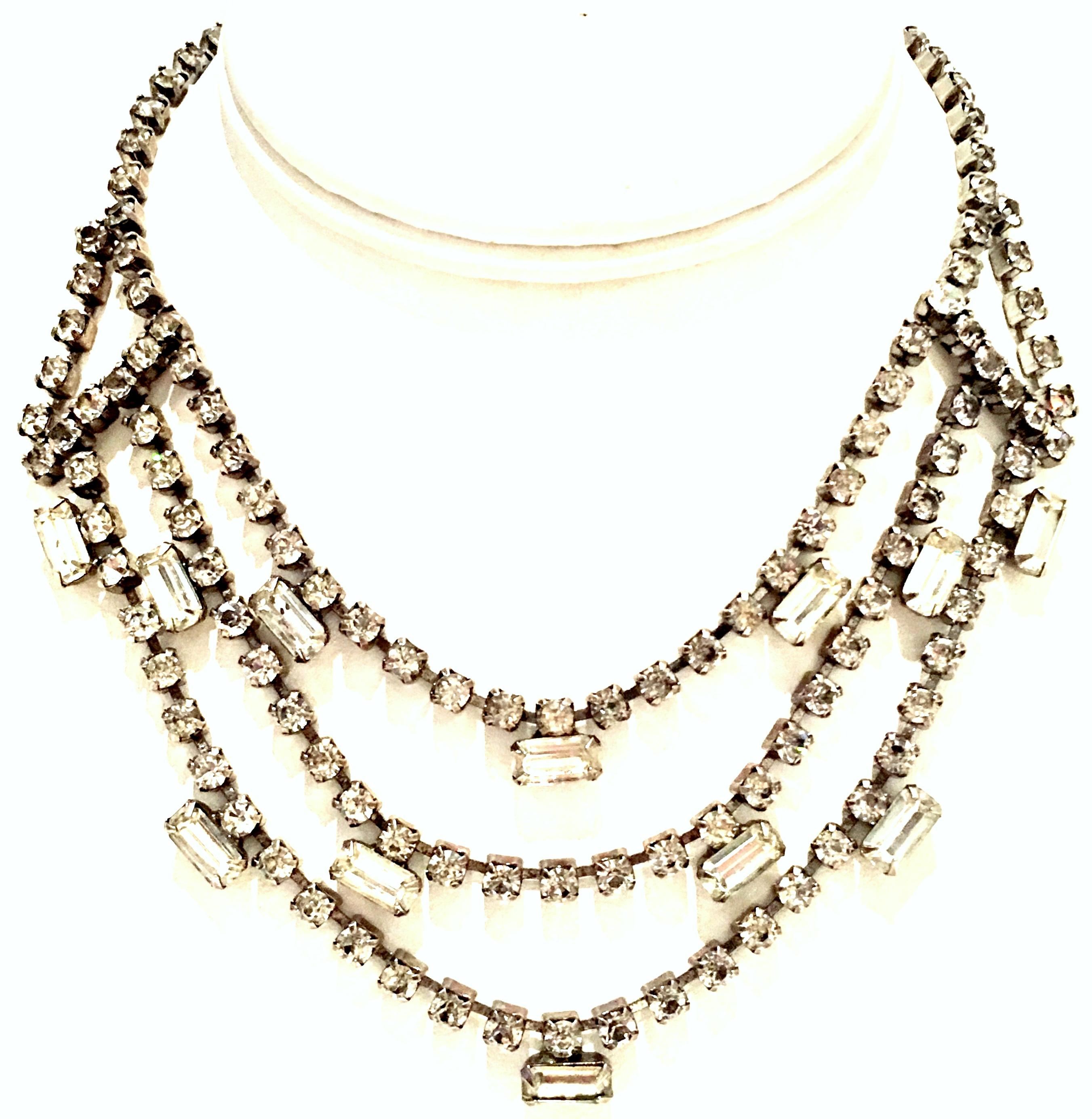 20th Century Silver & Austrian Crystal Art Deco Style Triple Row Choker Style Swag Necklace By. Features silver pot metal prong set round and baguette Austrian crystal clear stones. The baguette stones are approximately, .50