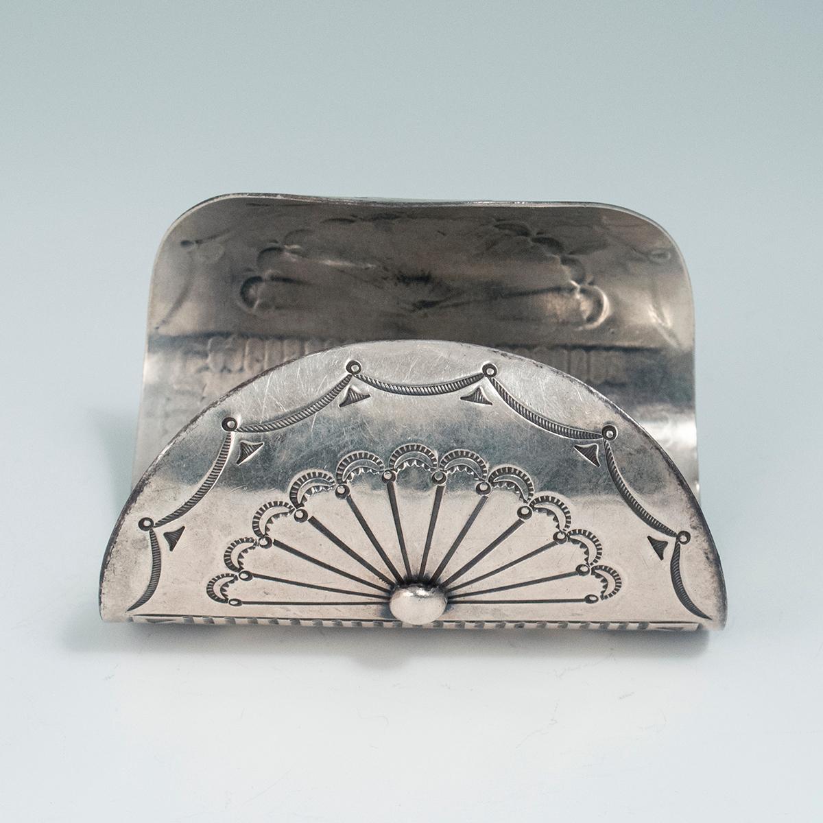 Mid-20th century silver Ketoh bow guard cuff bracelet by a Navajo Jeweler

A nice bow guard cuff from the 1960s-70s; it bears no markings or signatures. The interior circumference measures 6.75 inches, height is 3-3/8 inches, and it weighs 90