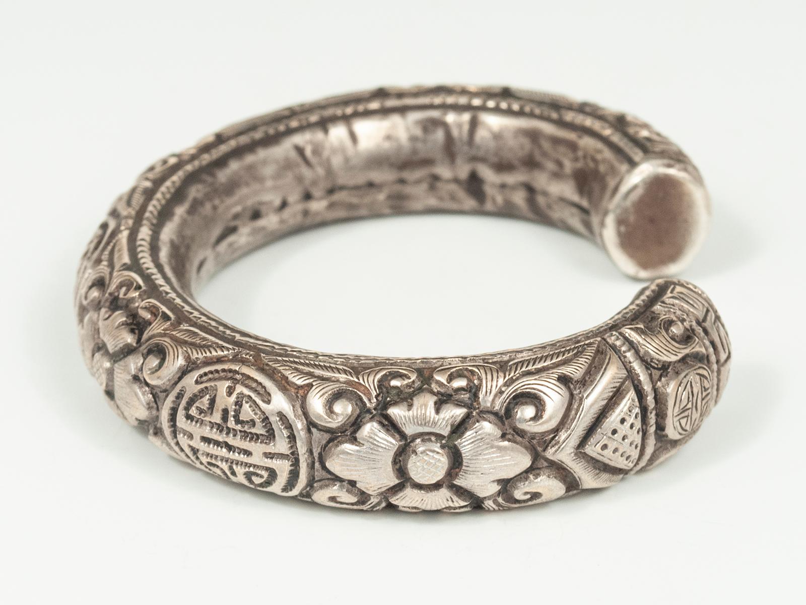 Tribal Mid-20th Century Silver Repoussé Bracelet, China For Sale