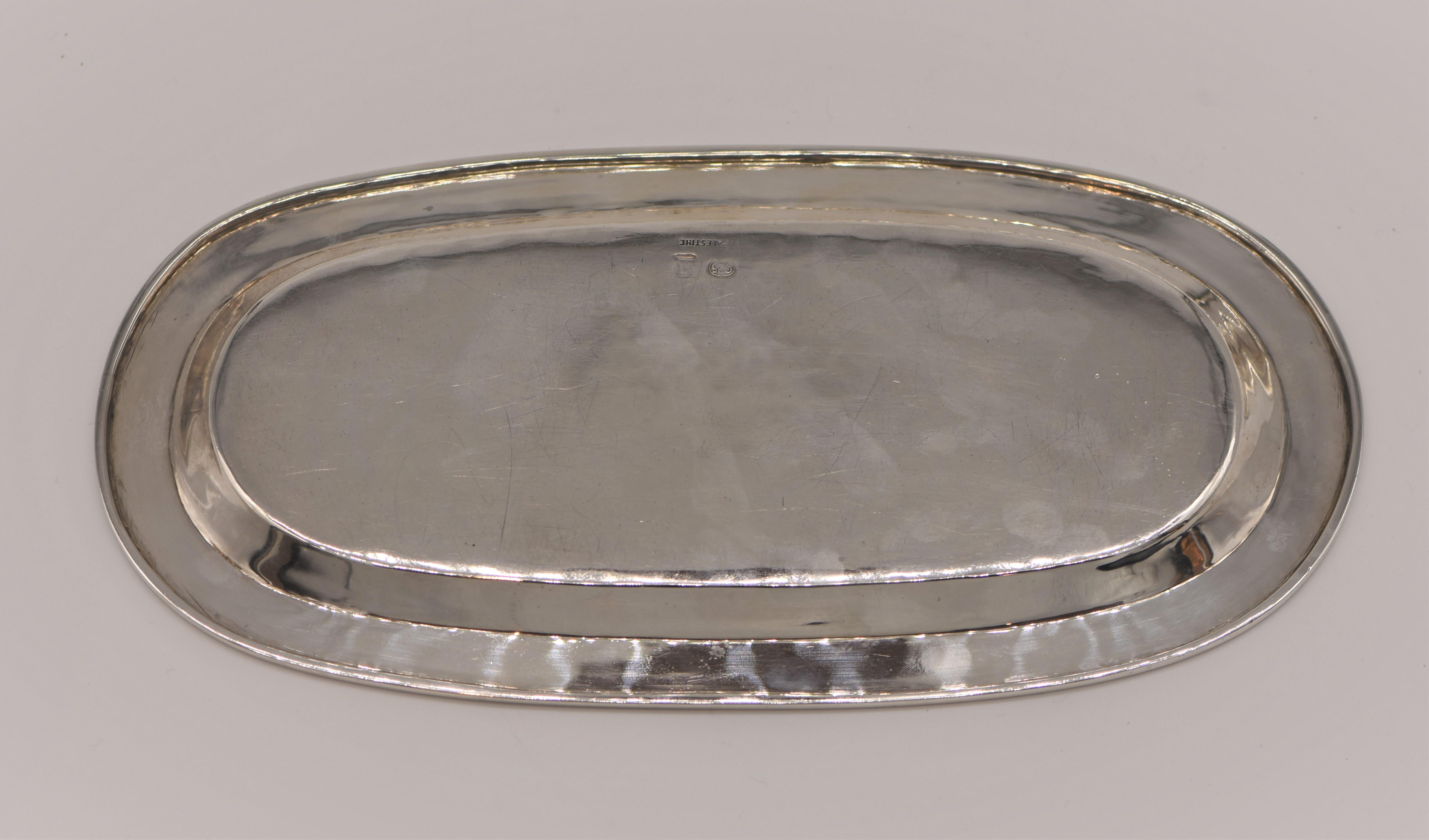 Hand hammered oval silver tray by David Heinz Gumbel, circa 1940.
Signed on the bottom with David Gumbel's hallmark, 925 for sterling silver, and 