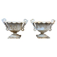Mid-20th Century Small Pair of Cast Iron Fluted Urns with Decorative Handles