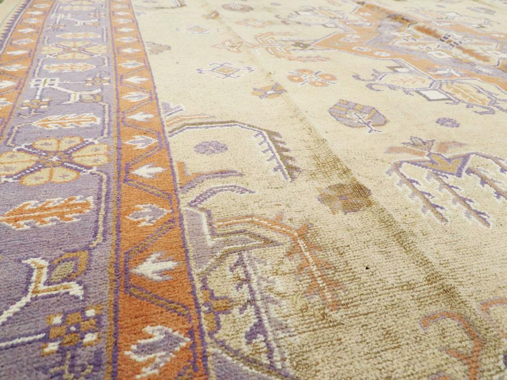 Mid-20th Century Soft Colored Oushak Carpet in Beige, Purple, and Orange In Good Condition For Sale In New York, NY
