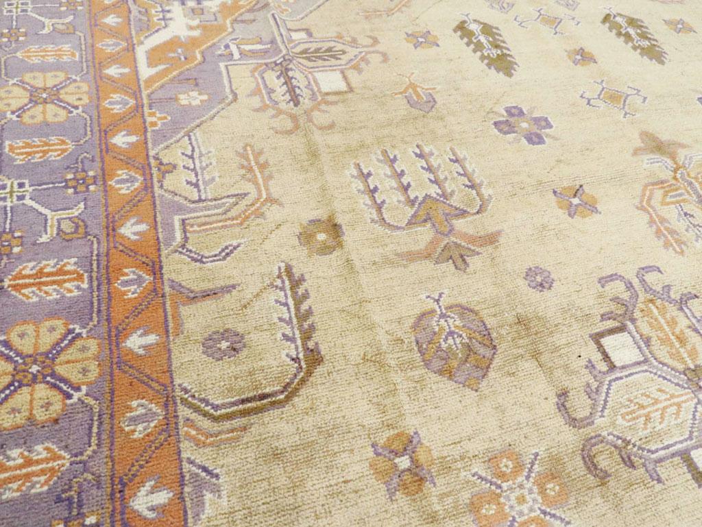 Wool Mid-20th Century Soft Colored Oushak Carpet in Beige, Purple, and Orange For Sale