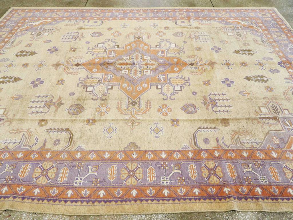 Mid-20th Century Soft Colored Oushak Carpet in Beige, Purple, and Orange For Sale 2