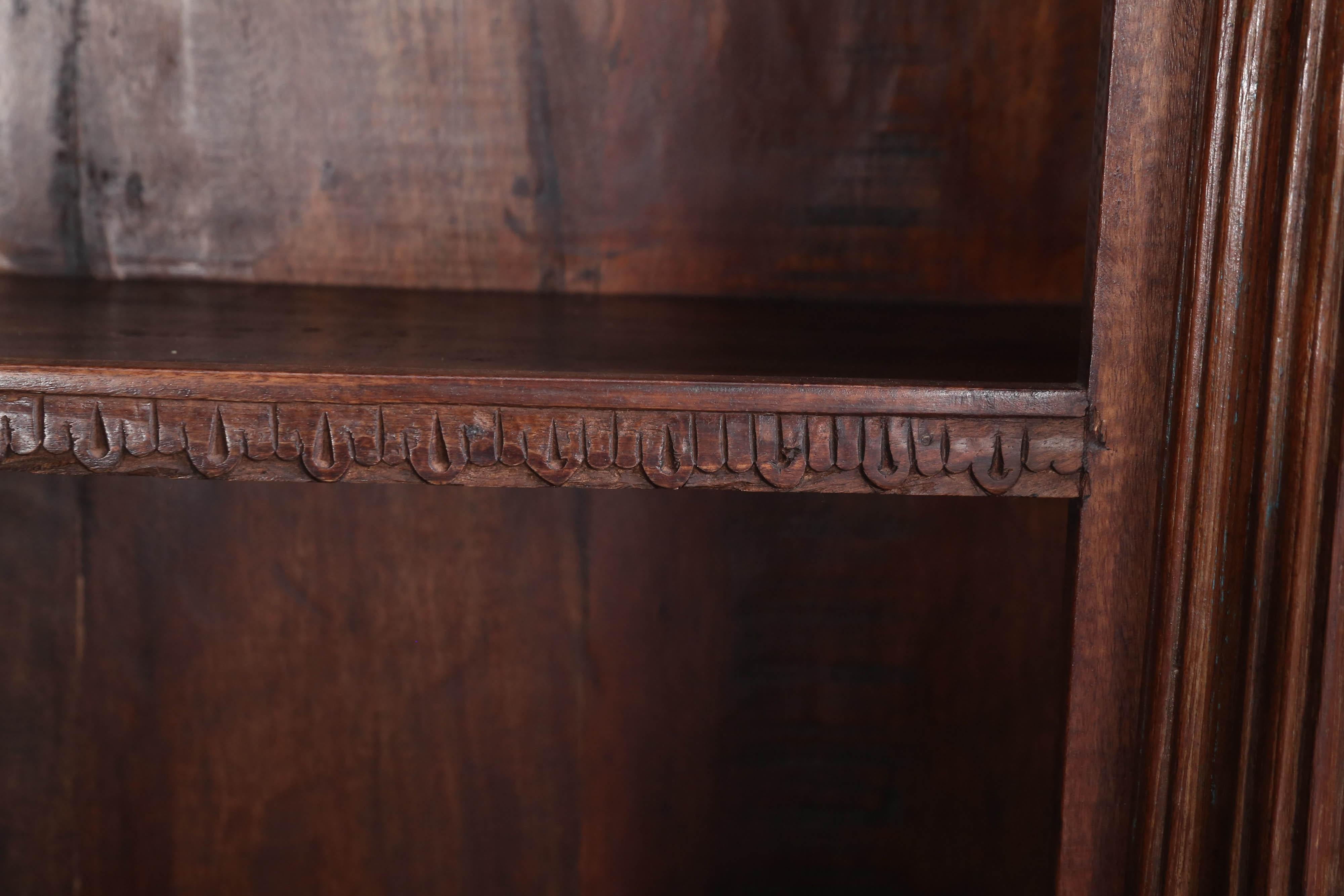 British Colonial Mid-20th Century Solid Teak Wood Bookcase with Solid Ornate Carved Columns