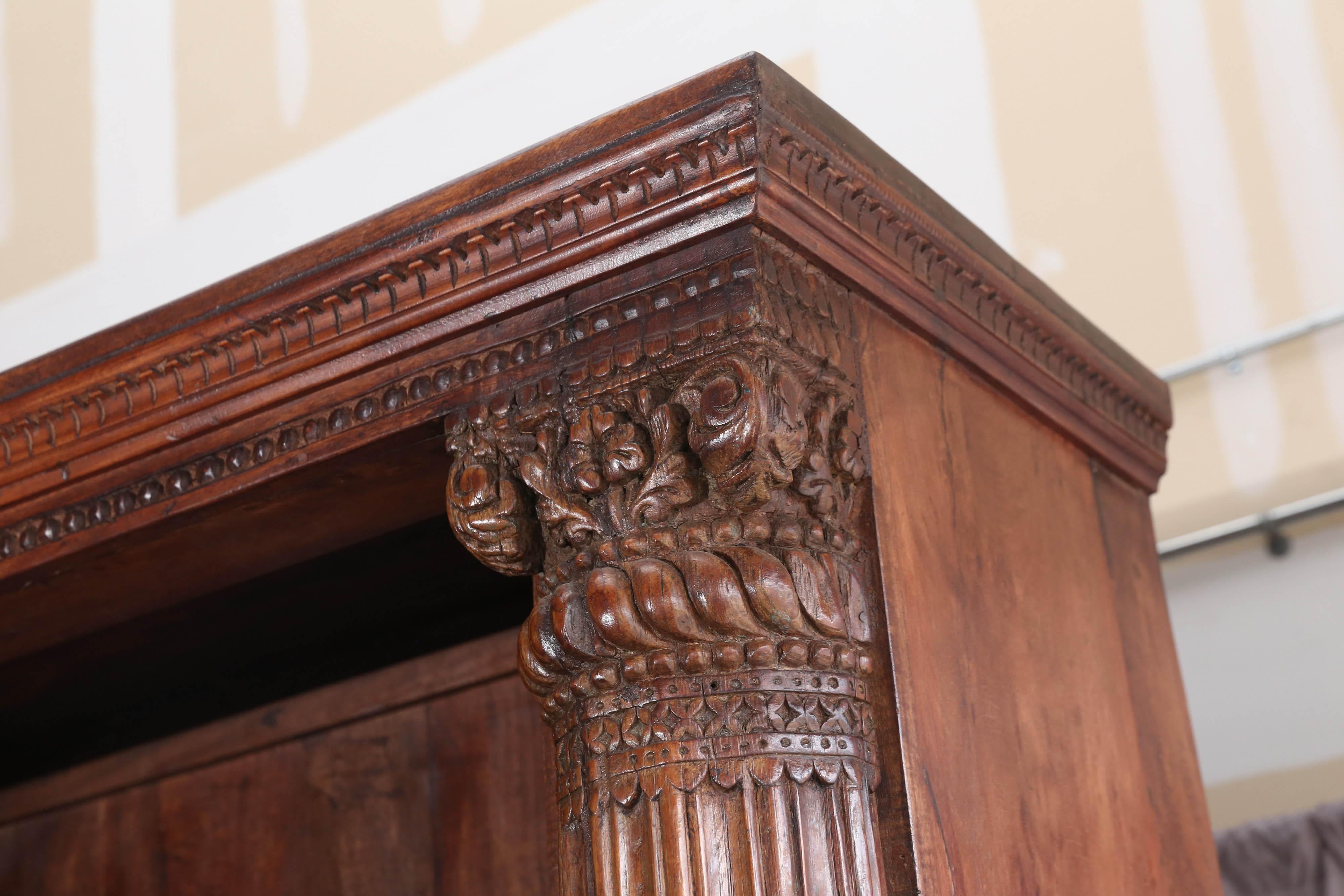 Indian Mid-20th Century Solid Teak Wood Bookcase with Solid Ornate Carved Columns