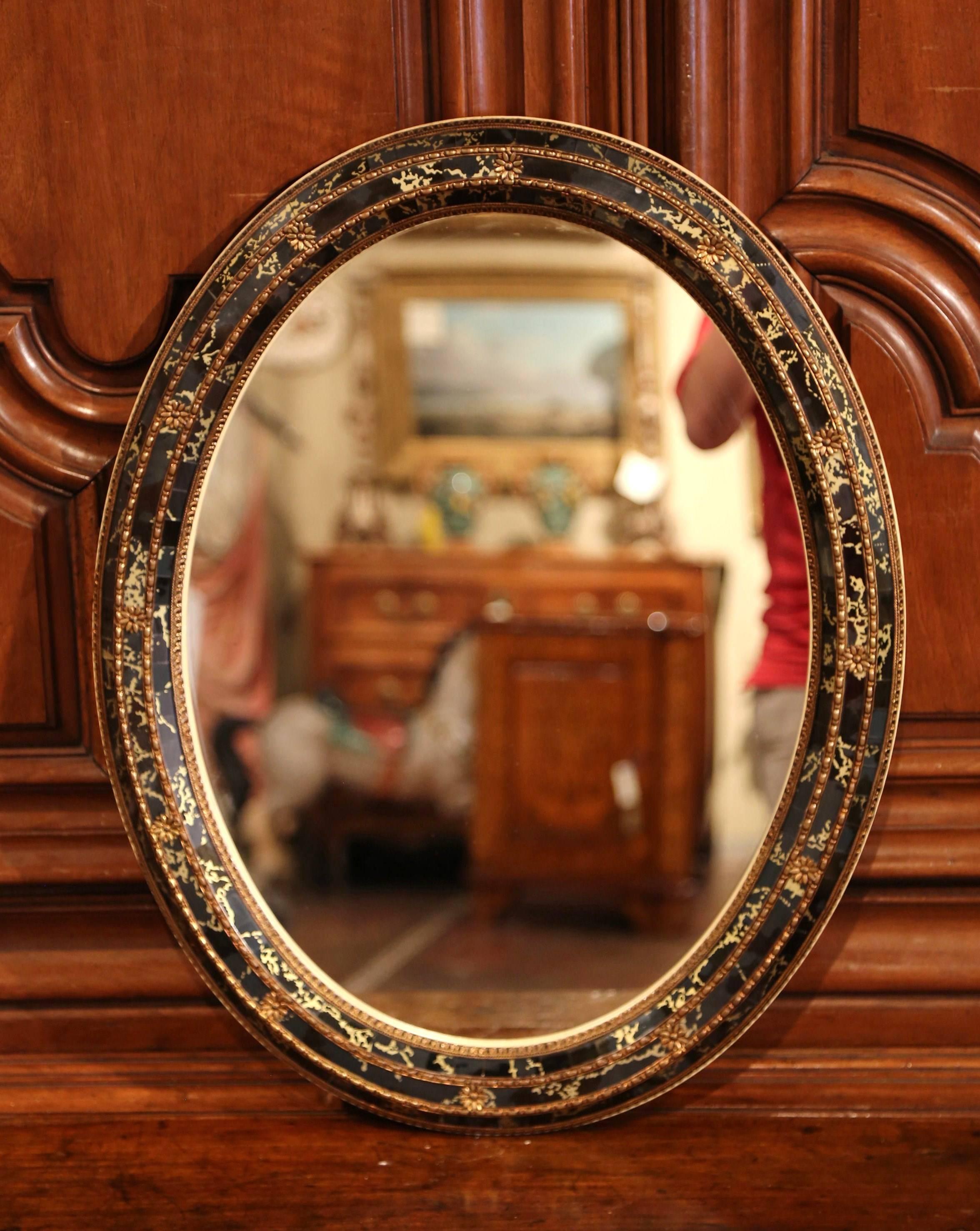 Cut Glass Mid-20th Century Spanish Black and Gilt Oval Mirror with 