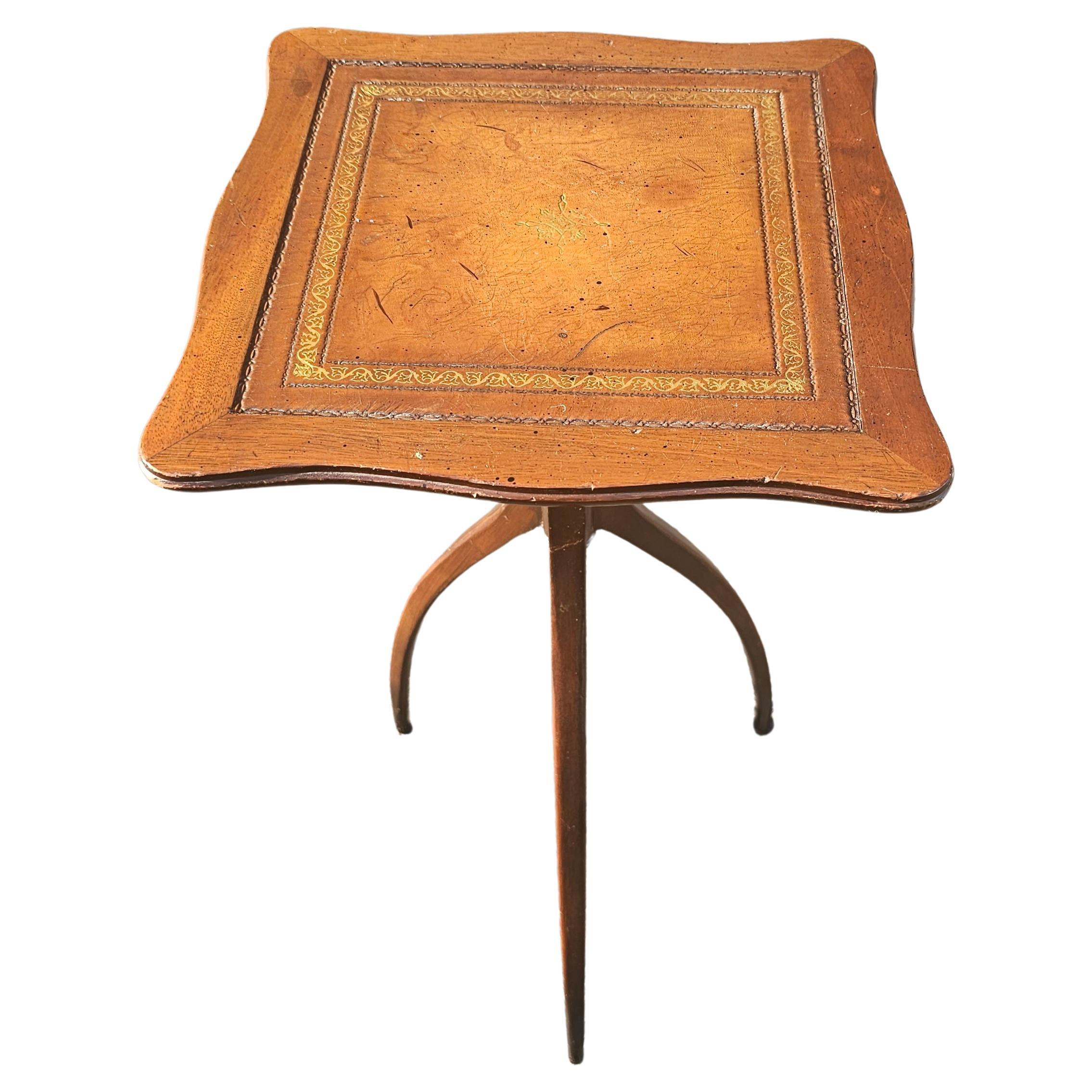 Mid 20th Century Spider Tripod Mahogany and Tooled Leather Top Candle Stand.
Measures 11