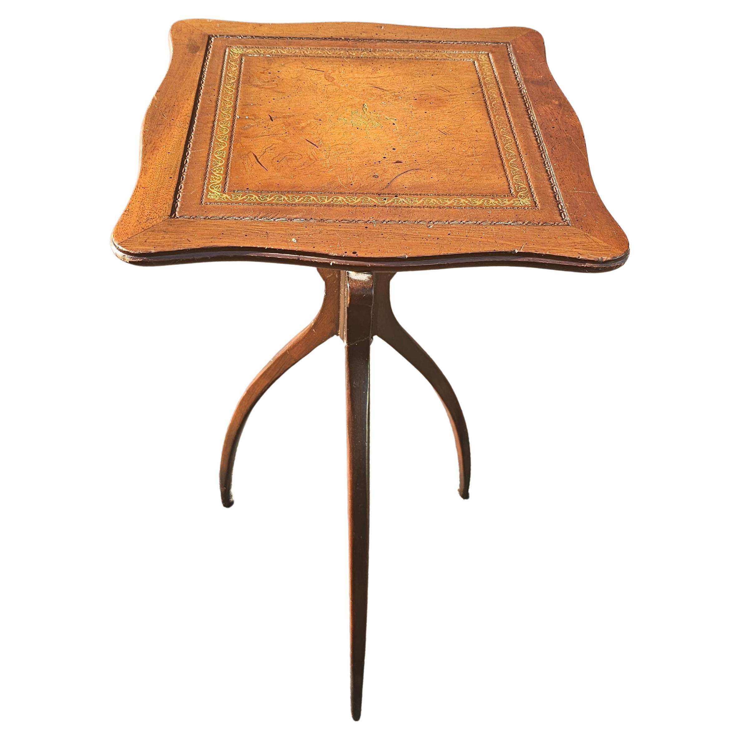 Hollywood Regency Mid 20th Century Spider Tripod Mahogany and Tooled Leather Top Candle Stand For Sale