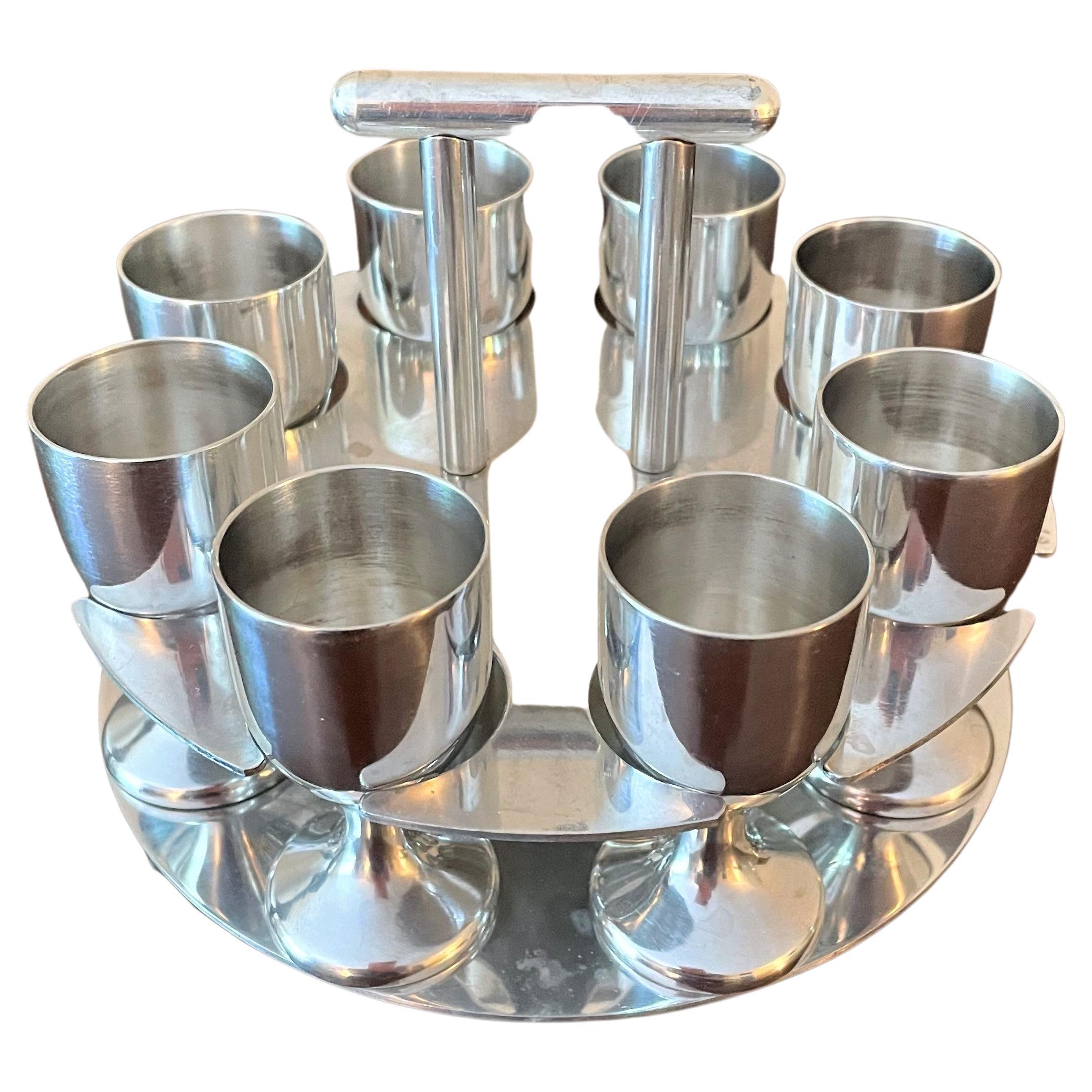 This set of 8 stainless steel cordials / aperitifs or shot glasses is attributed to Arne Jacobsen, the sought-after mid-century Danish architect and designer of the Functionalist Movement. Jacobsen was among the 20th century's most famous designers.