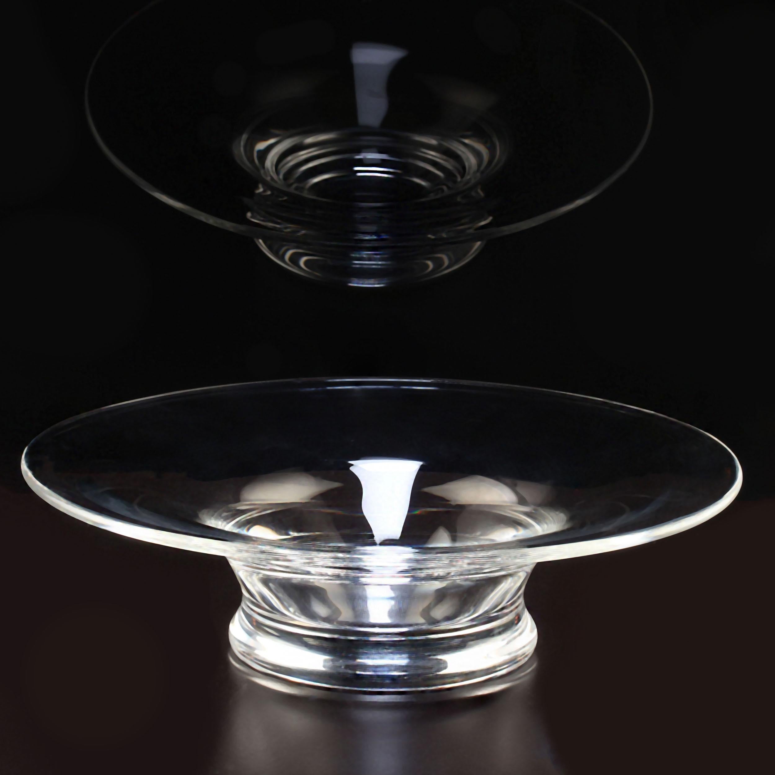 Steuben Hand-Blown Glass Footed ‘Flare’ Bowl

This exquisite Steuben bowl is a stunning example of midcentury modern design, combining elegance with timeless craftsmanship. Its minimalistic aesthetic and delicate proportions make it a versatile
