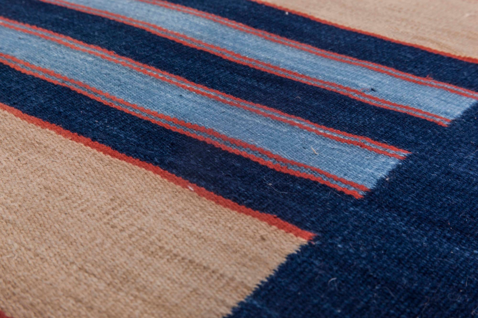 Mid-20th century striped navy blue with apricot yellow Indian Dhurrie rug 
Size: 18'7