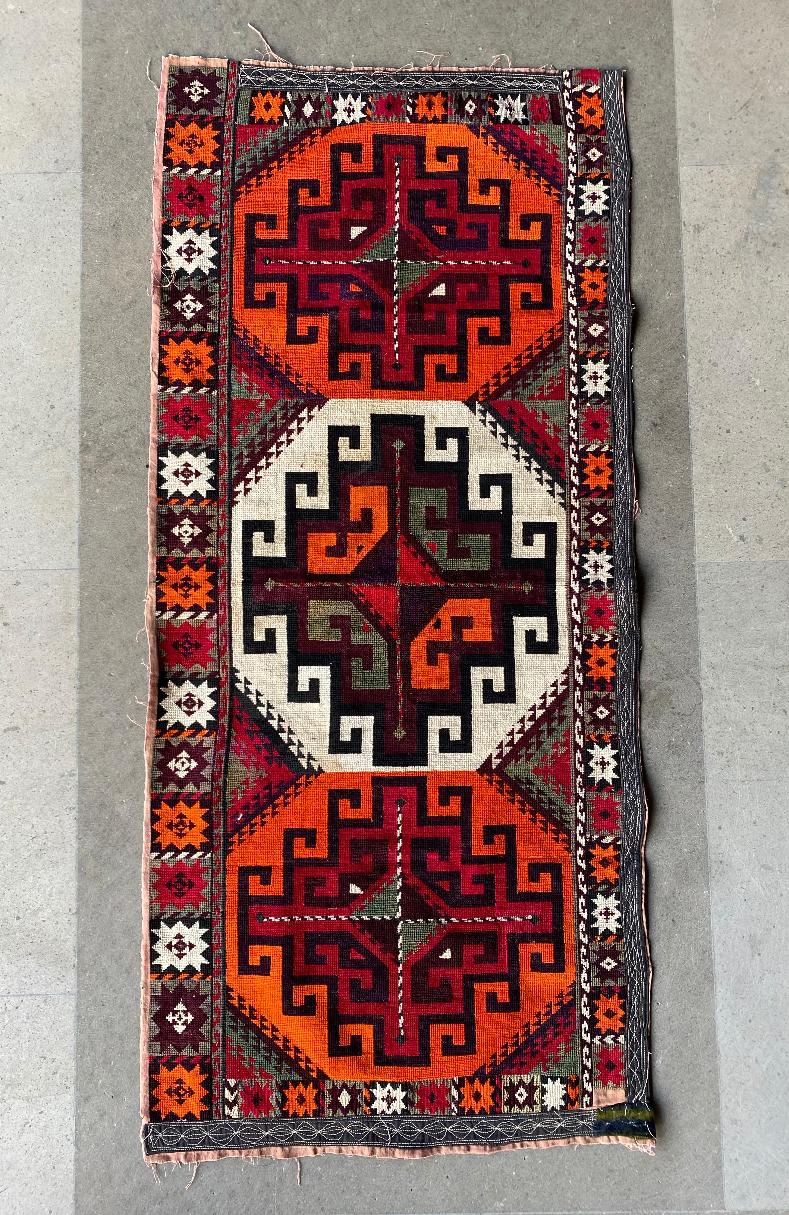 This textile is a “Suzani” from Central Asian nomadic peoples primarily from Kazakhstan, Tajikistan and Uzbekistan. Suzanis are embroidered textiles composed of mainly Cotton. They are cherished and admired for their elaborate designs, motifs and