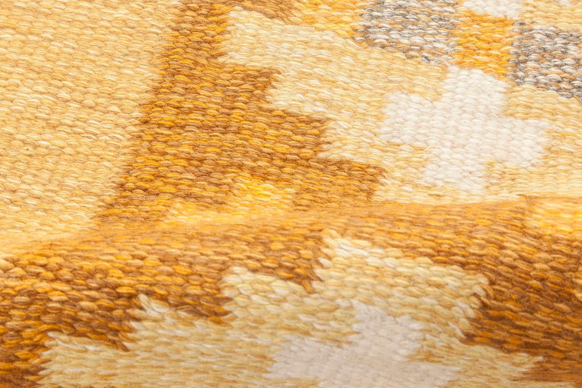 Mid-20th century yellow brown Swedish flat-weave rug by Birgitta Solderkvist
Size: 4'4