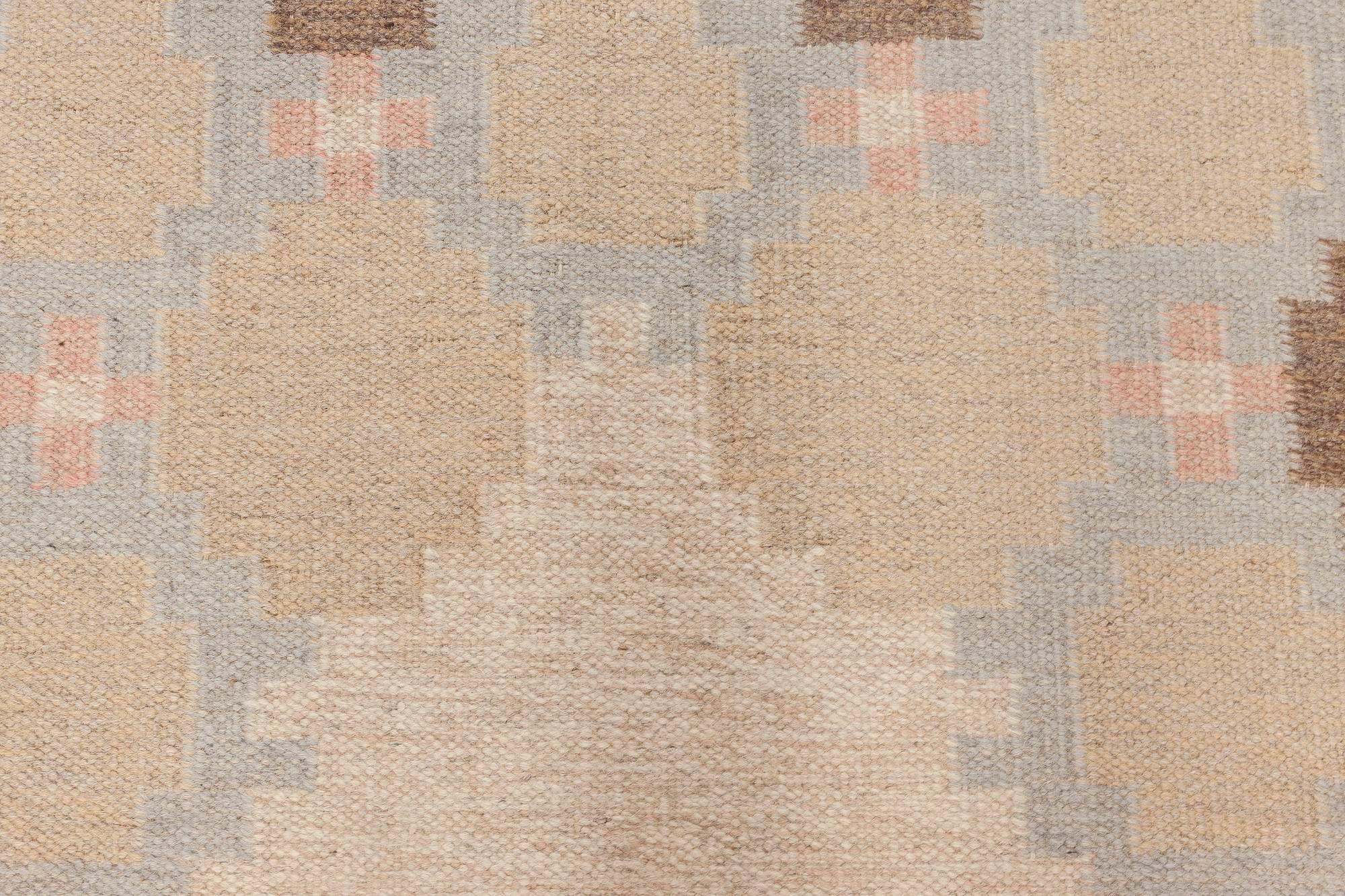 Mid-20th century Swedish beige, brown and blue flat-weave wool rug
Size: 5'9