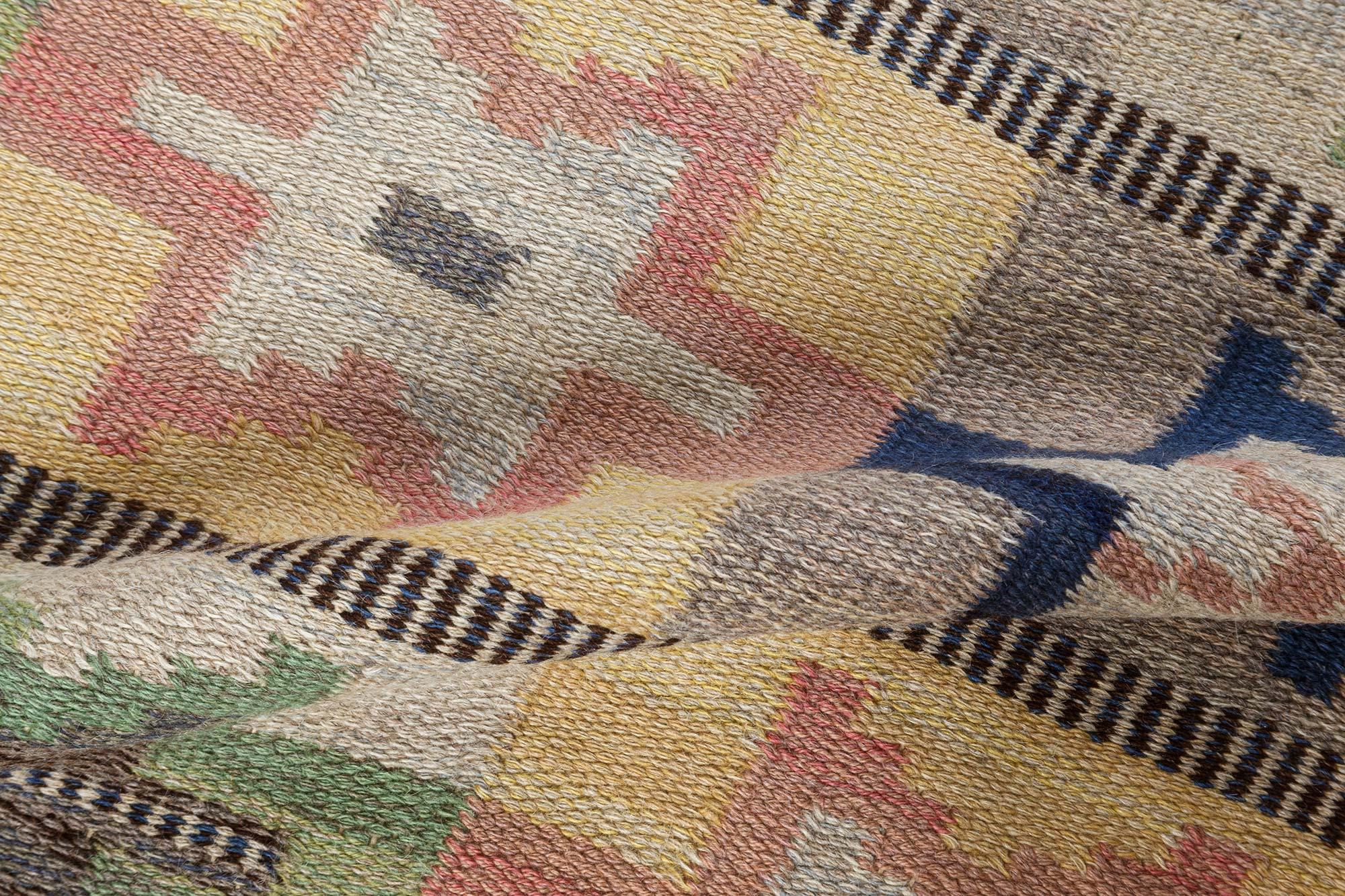 Mid-20th century Swedish green, pink, amber, blue, gray flat-weave wool rug
Size: 4'10