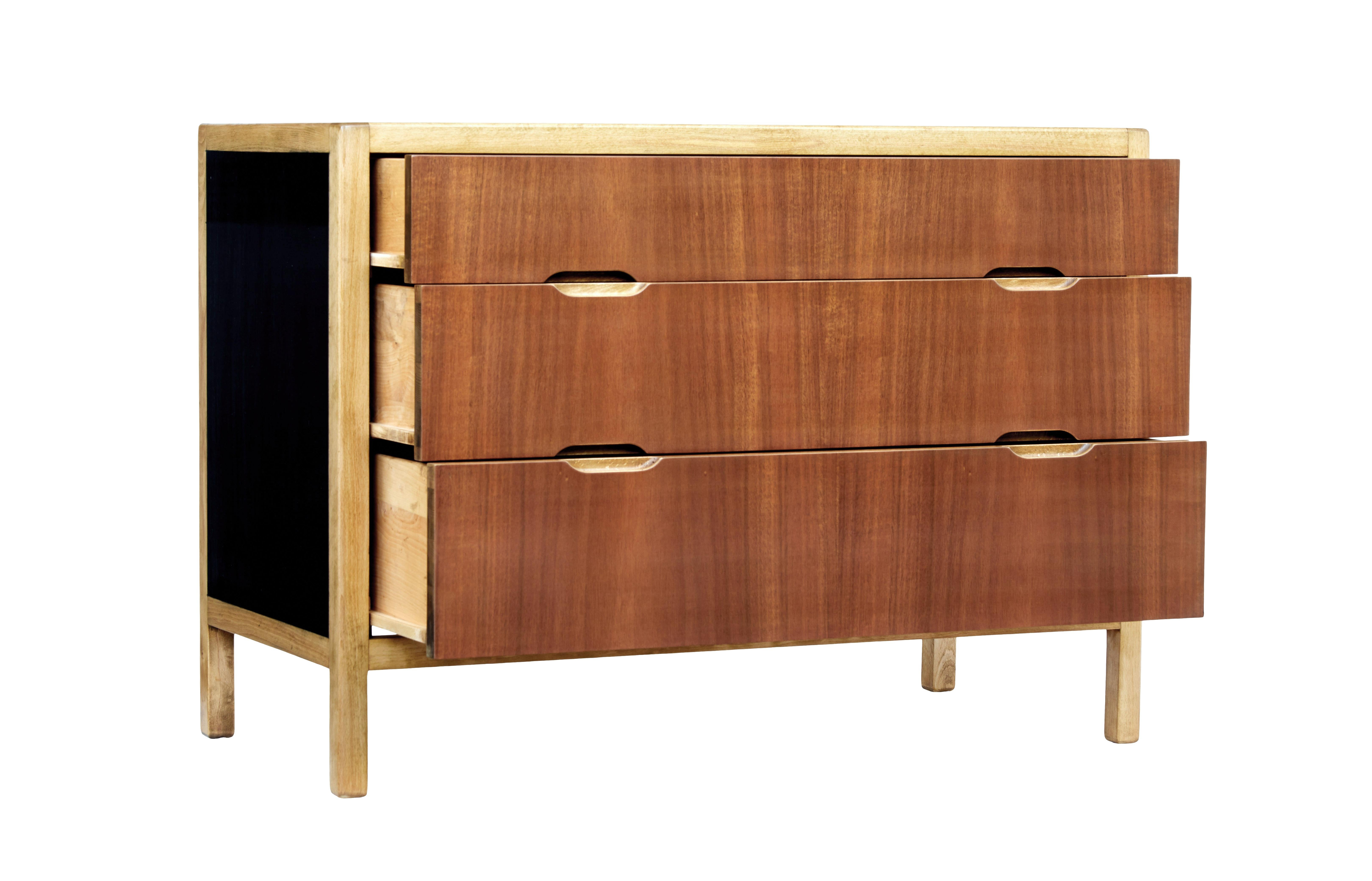 Good quality swedish chest of drawers by forenades mobler of linkoping, circa 1960.

Outer birch frame with ebonised side and top panels, complete with contrasting teak drawer fronts with inset handles.

Stamped on the reverse forenades mobler