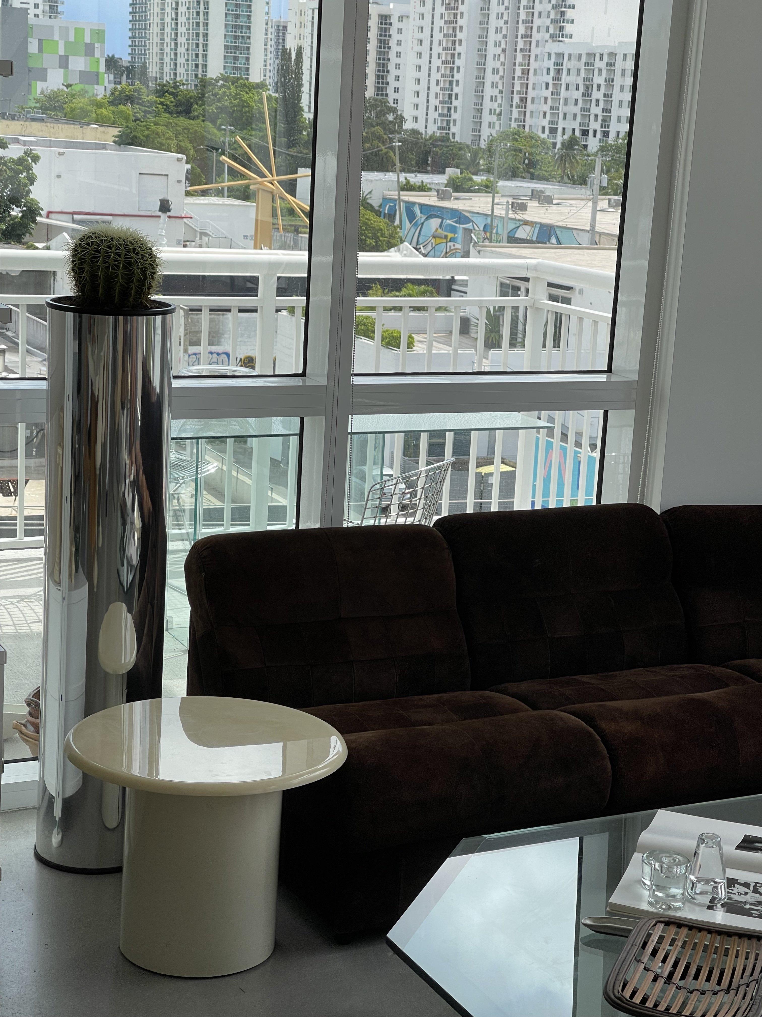 Mid 20th century tall chrome wrap cylinder planter with plastic removable top for soil and plants. Made from HDPE material and cardboard with a chrome foil wrap. 

Dimensions:
4' H
10