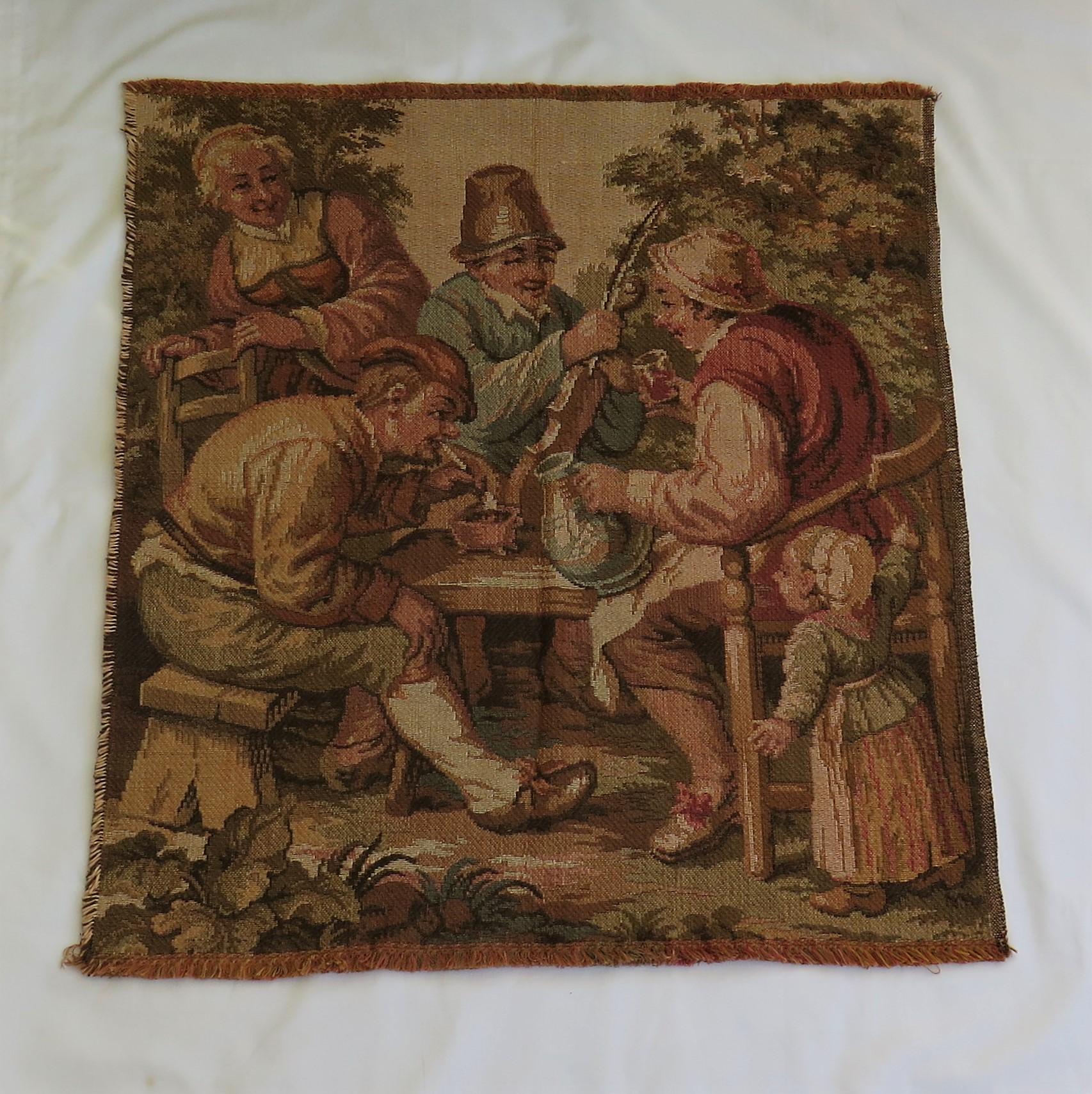 This is a vintage French woven tapestry panel, in the Aubusson style, showing a group of figures in period costumes, dating to the early 20th century, circa 1930.

This is a woven panel measuring 23.5 inches wide by 26 inches high with many possible