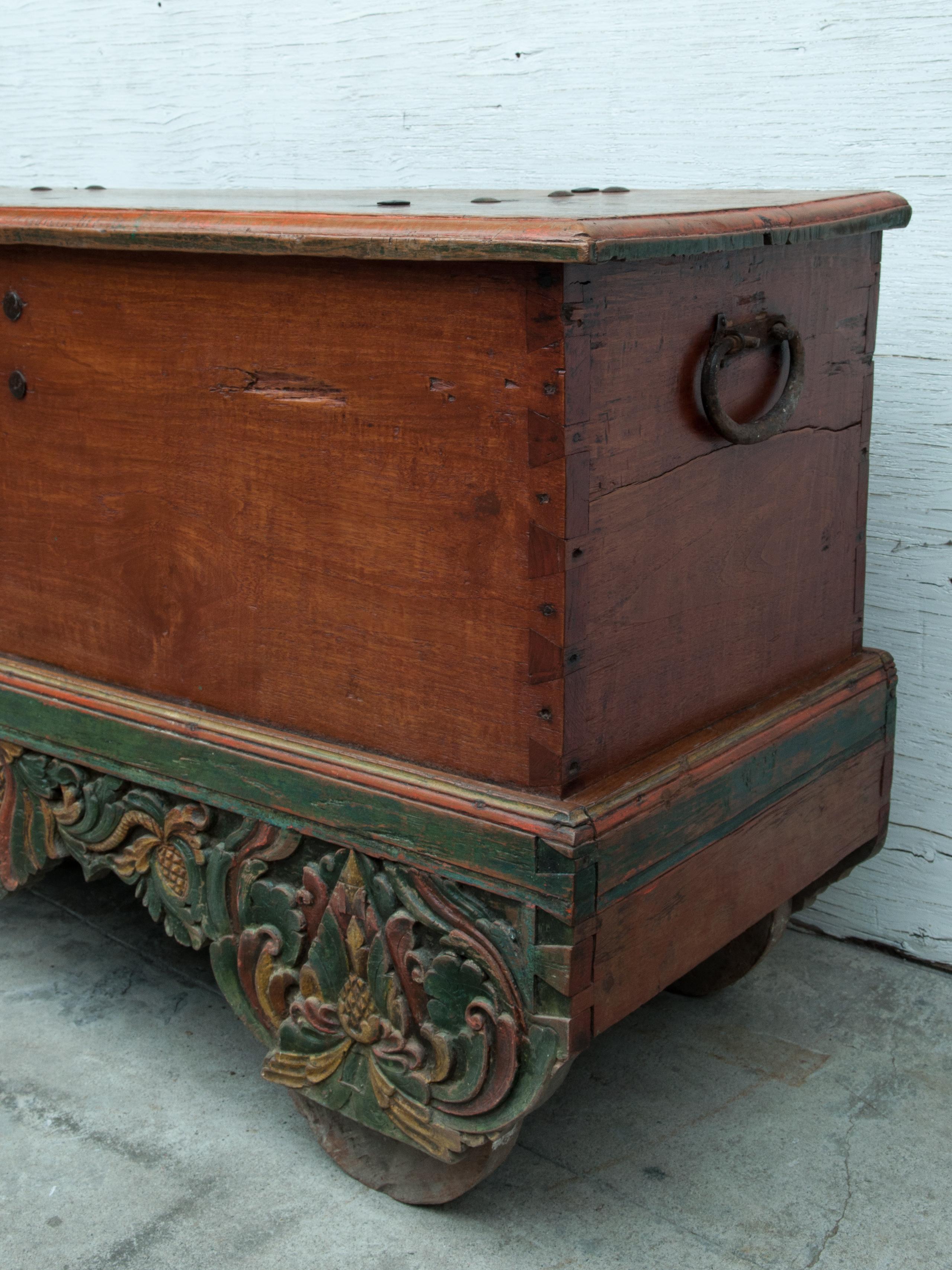Hand-Crafted Mid-20th Century Teak Chest on Wheels from Java. Original Color and Hardware.