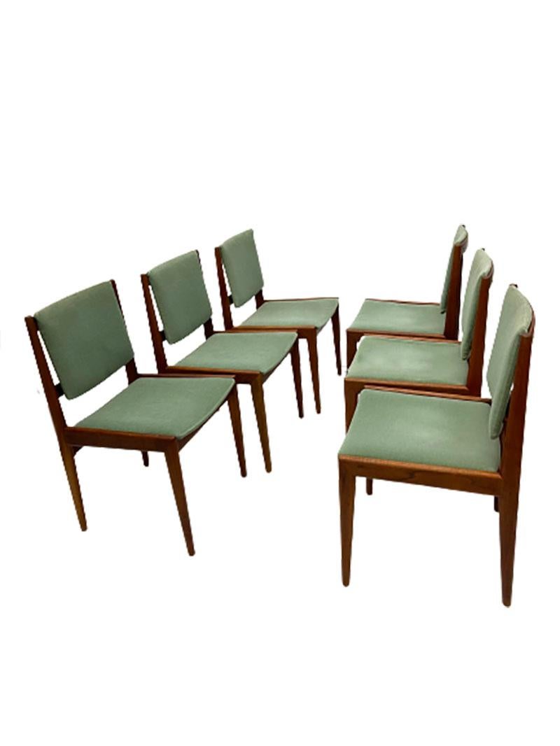 Mid 20th Century teak dining chairs

6 Dining Room Chairs in teak color with light green velvet fabric. With round shaped legs and round shaped sides of the backrest. The chairs are marked with the impressed letter R at the bottom. 
The chairs