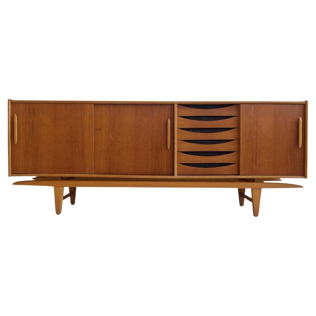 Bold Teak Sliding Door Sideboard with Lacquered Drawers at 1stDibs