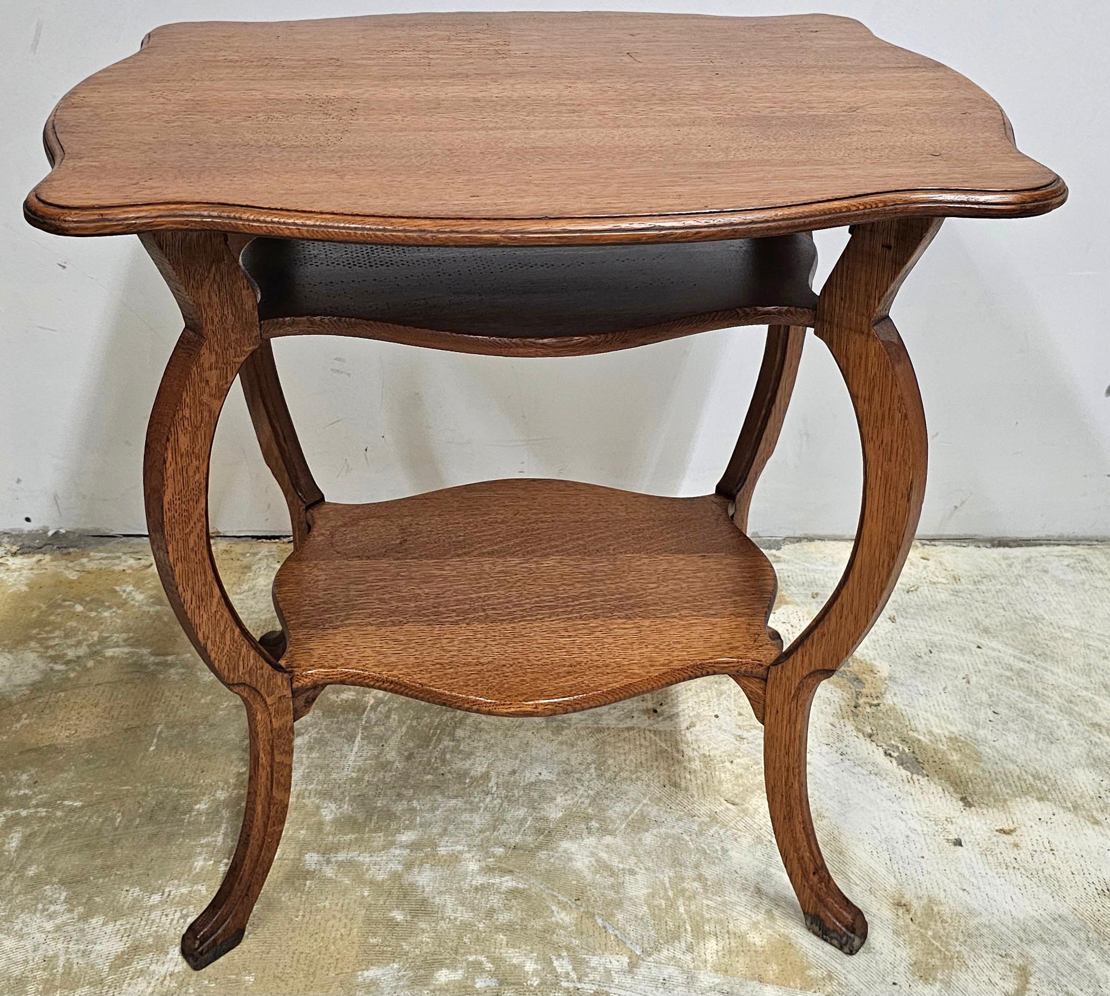 American Mid 20th Century Three Tier Victorian Style Oak Accent Table For Sale