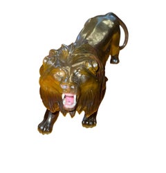 Mid-20th Century Tiger’s Eye Quartz Lion Carving Attributed to Georg O. Wild.