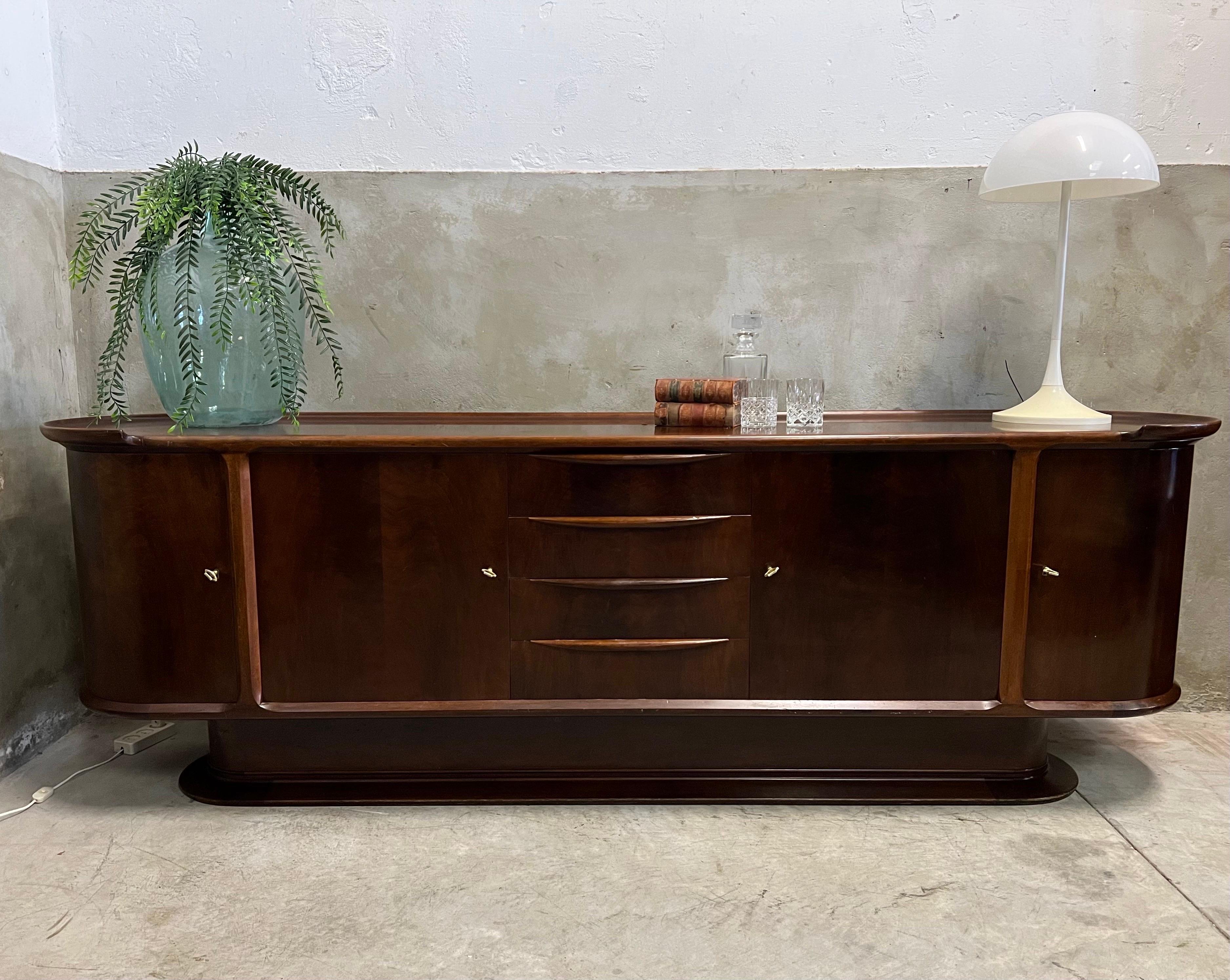 Top quality AA Patijn sideboard from the 1950s for Zijlstra. Already 70 years on this globe but still in a very nice condition. Minor signs of use, of course, but really nothing disturbing.

This AA Patijn sideboard has curved doors, left and