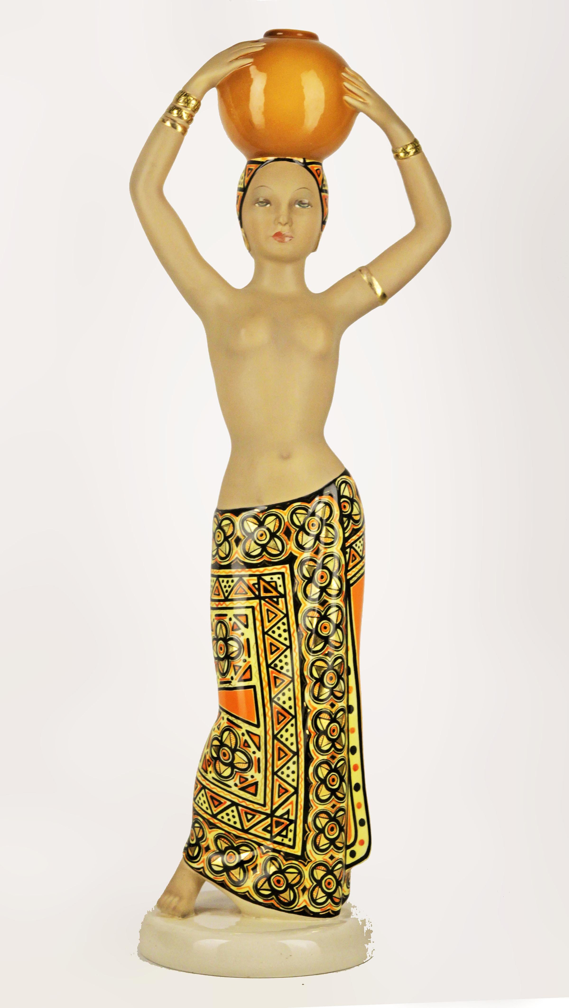 Mid-20th century Torino ceramic semi-nude woman sculpture 'Portatrice Africana' by C.I.A. Manna

By: C.I.A. Manna
Material: ceramic, paint
Technique: gilt, glazed, hand-crafted, molded, painted, pressed, unglazed
Dimensions: 6 in x 22 in
Date: