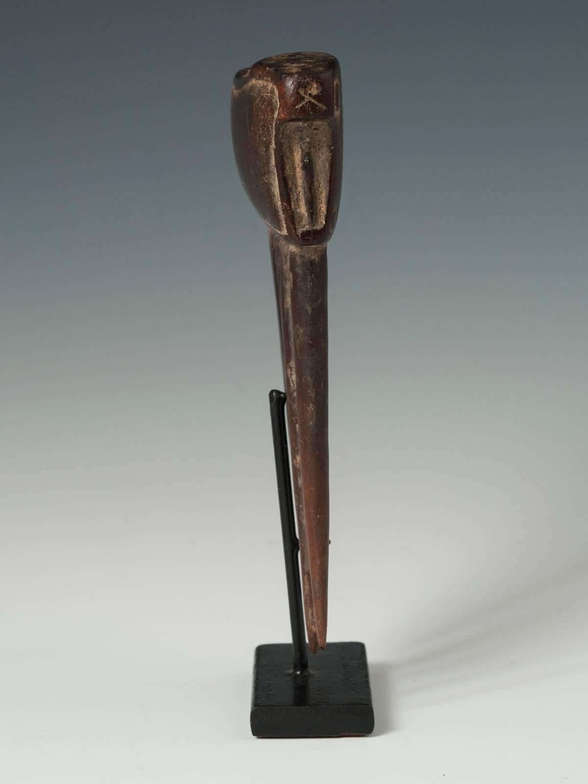 Hand-Carved Mid-20th Century Tribal African Wood Comb from the Baule, Cote d'Ivoire