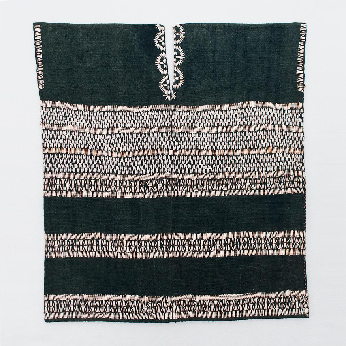 Mid-20th century tribal woman's tunic, Karen People, Burma

A nice, graphic example of a woman's blouse from the Karen ethnic group in Burma/Myanmar. The Job's tears seeds (Coix lacryma-jobi) are in great condition with only one or two missing. The