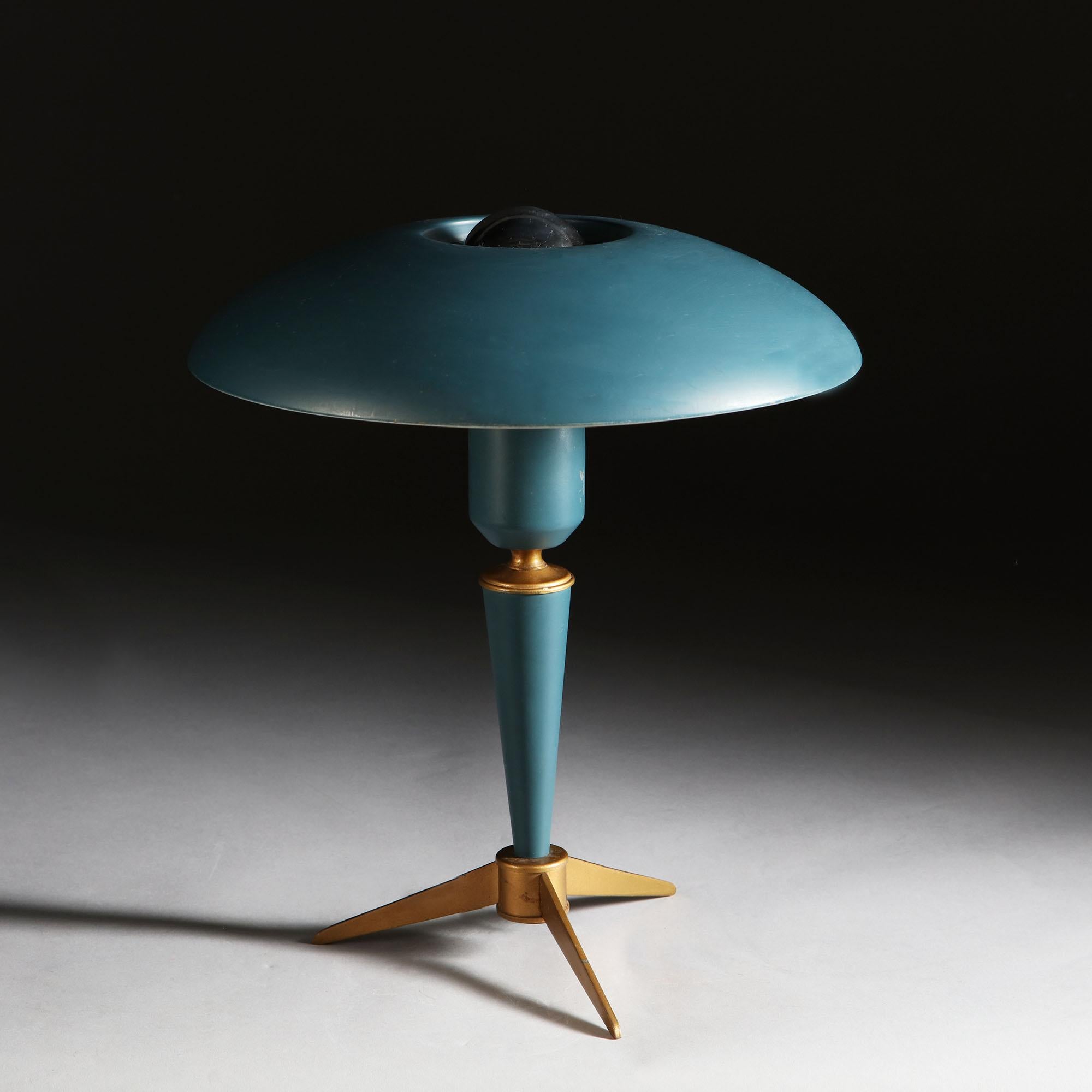 A mid-20th century tripod desk lamp in brass and green painted metal, designed in 1958 by Louis Kalff for Philips, Eindhoven. Model TL1012.

Currently wired for the UK. Please enquire for rewiring services.