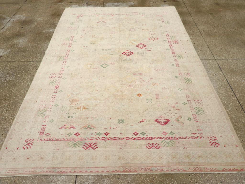 A vintage Turkish Anatolian accent rug handmade during the Mid-20th century.

Measures: 6' 3