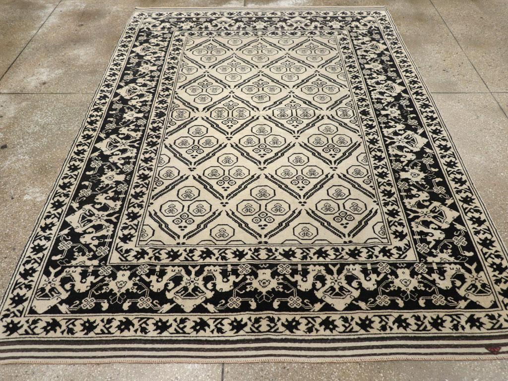 A vintage Turkish Anatolian accent rug handmade during the Mid-20th century.

Measures: 6' 4