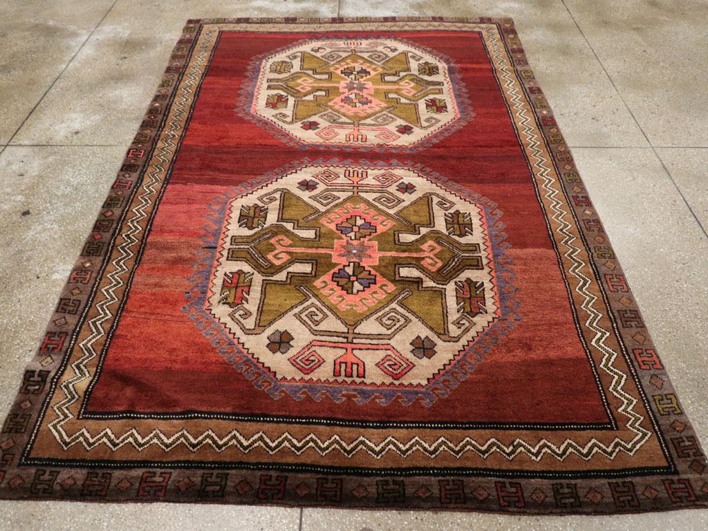 A vintage Turkish Anatolian accent rug handmade during the Mid-20th century.

Measures: 6' 5
