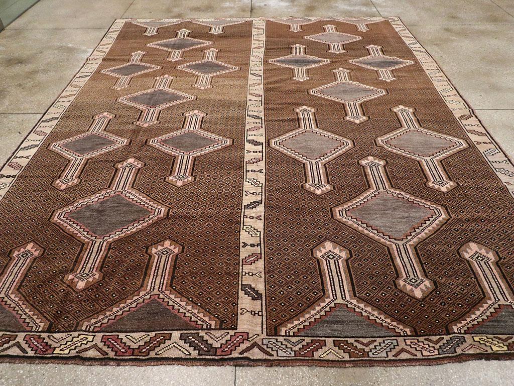 A vintage Turkish Anatolian room size carpet handmade during the Mid-20th century.

Measures: 10' 2