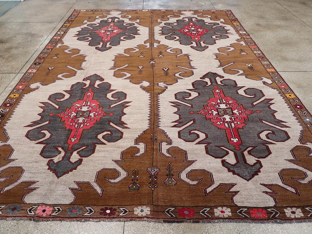 A vintage Turkish Anatolian room size carpet handmade during the Mid-20th century.

Measures: 10' 2
