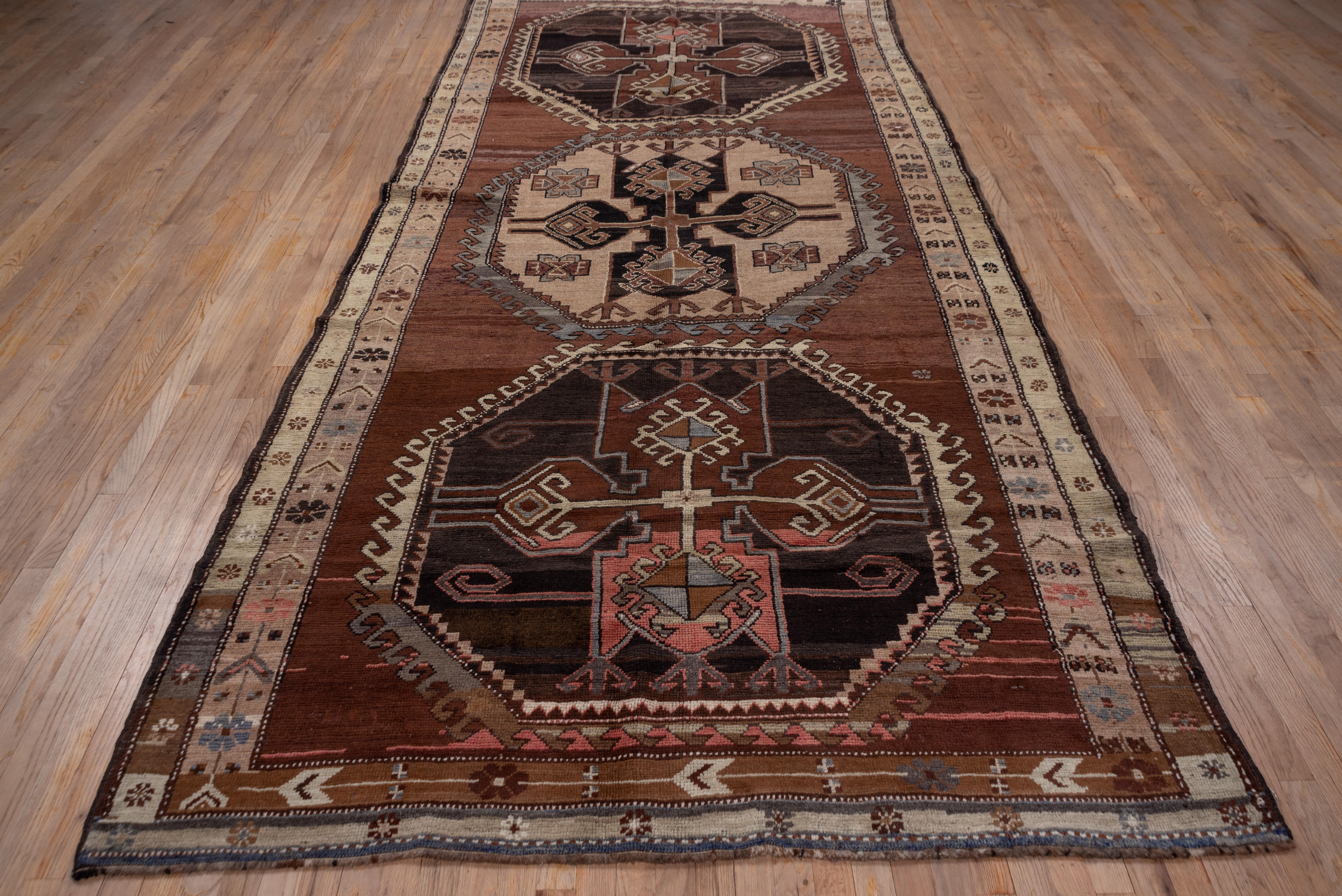 Mid 20th Century Turkish Kars Gallery Rug, Rustic Palette, Colorful Accents In Good Condition For Sale In New York, NY