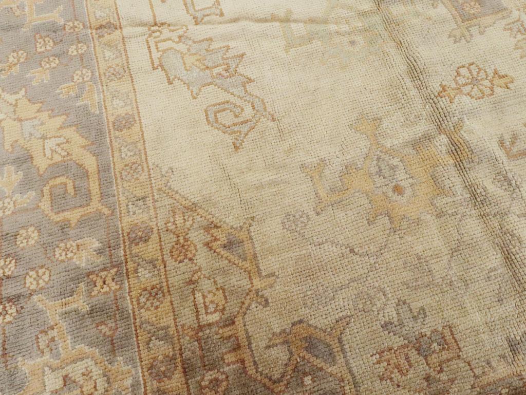 Hand-Knotted Mid-20th Century Turkish Oushak Room Size Carpet For Sale