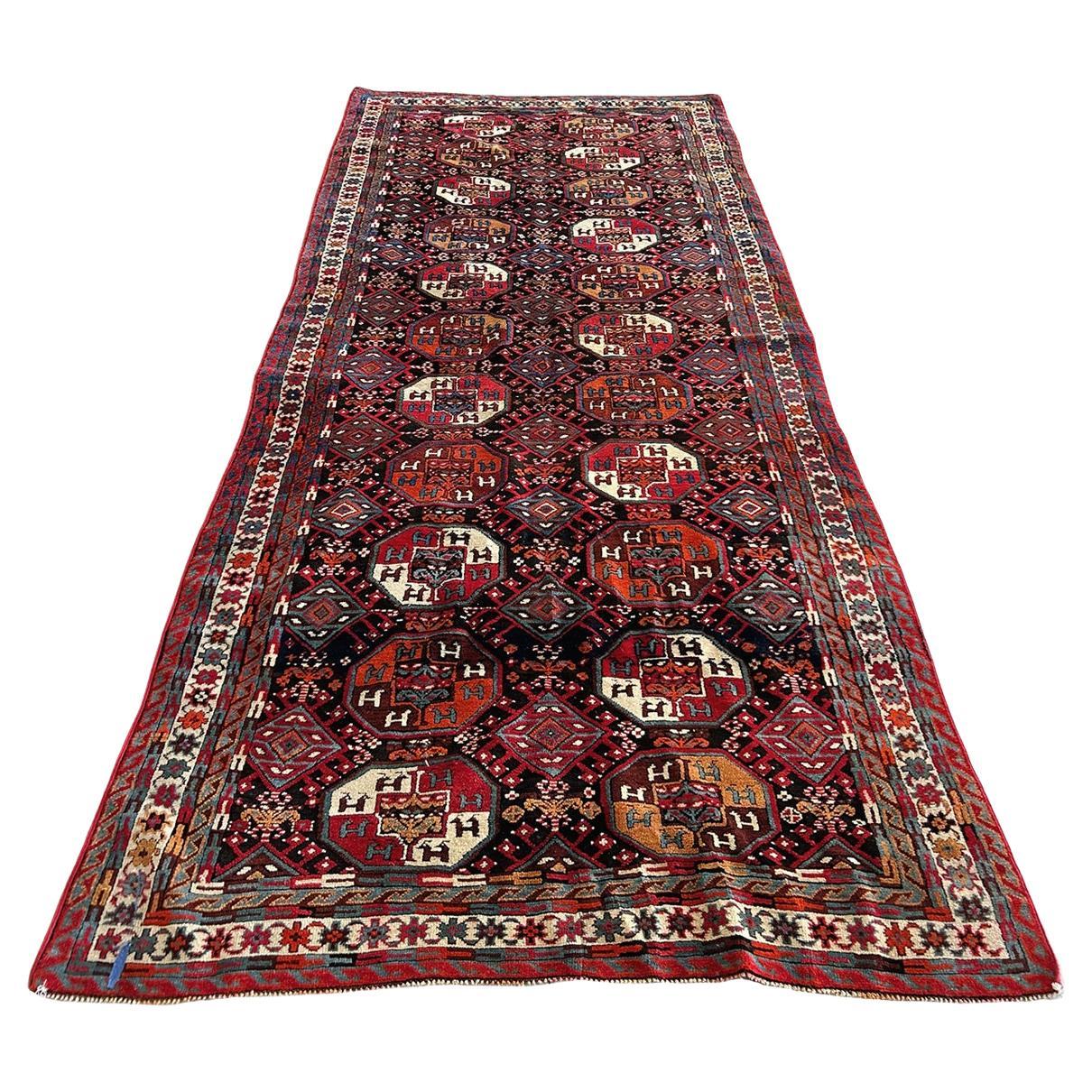 Alfombra turca de mediados del siglo XX  11' 6" x 5' en venta
