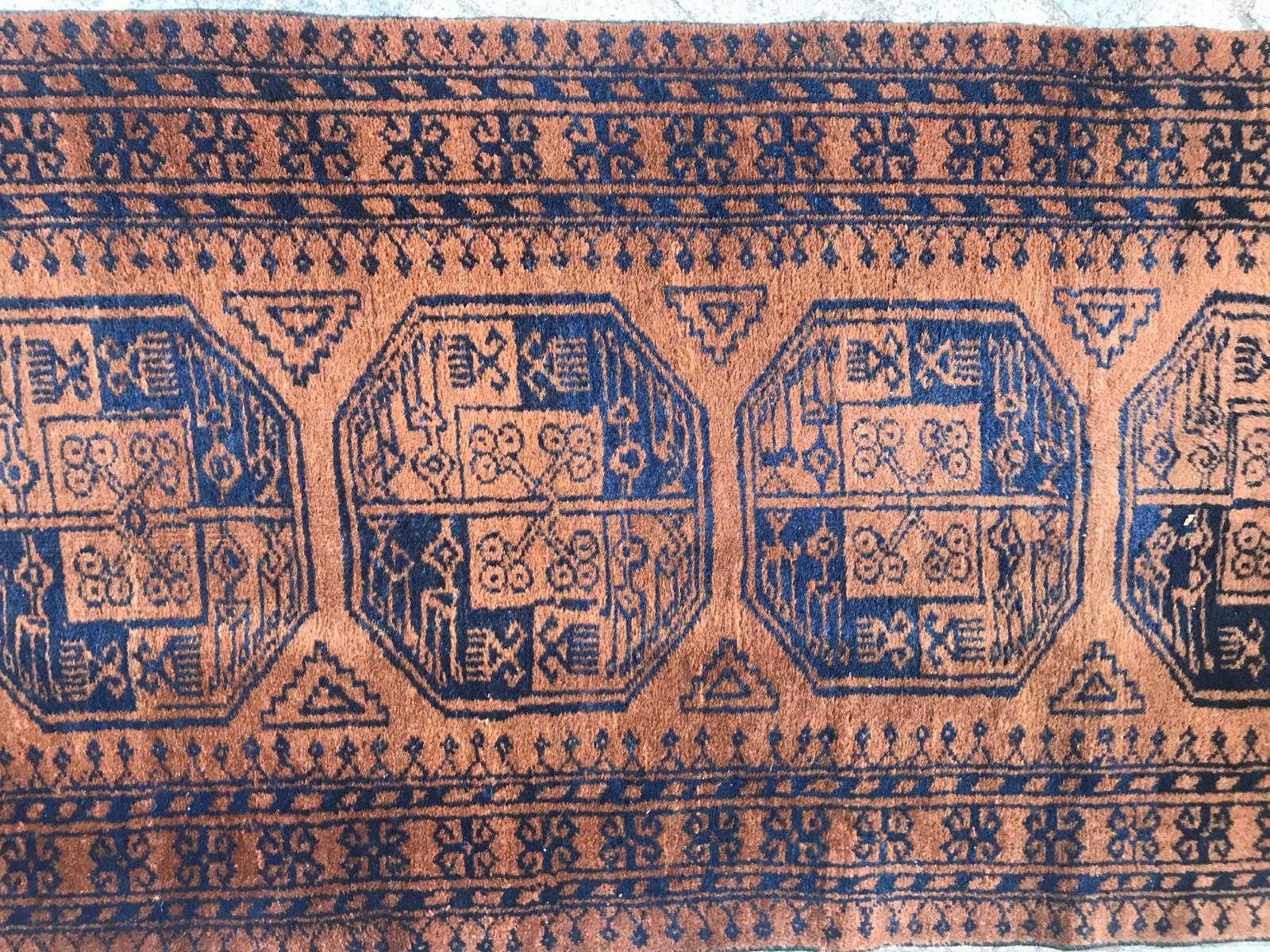Nice Turkmen Afghan runner with a beautiful geometrical Turkmen design and nice colors with light brown, blue and black, entirely hand knotted with wool velvet on wool foundation,.